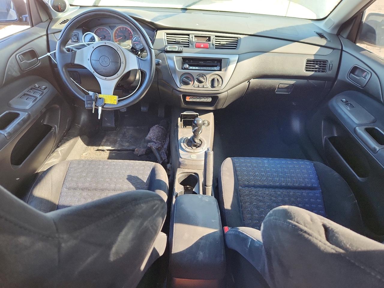 2005 Mitsubishi Lancer Evolution Черный vin: JA3AH86D95U036905