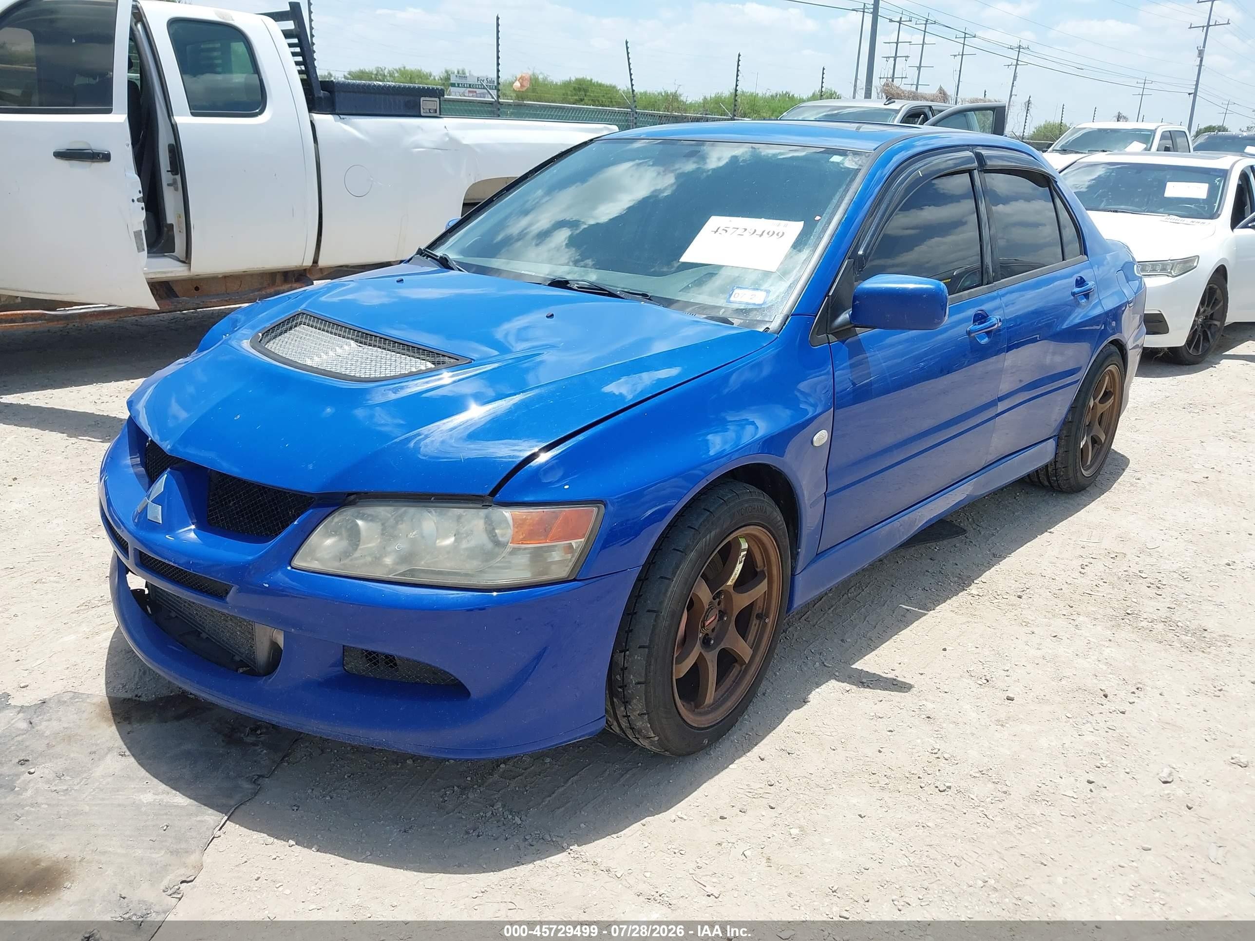 2003 Mitsubishi Lancer Evolution   Blue vin: JA3AH86F73U121000