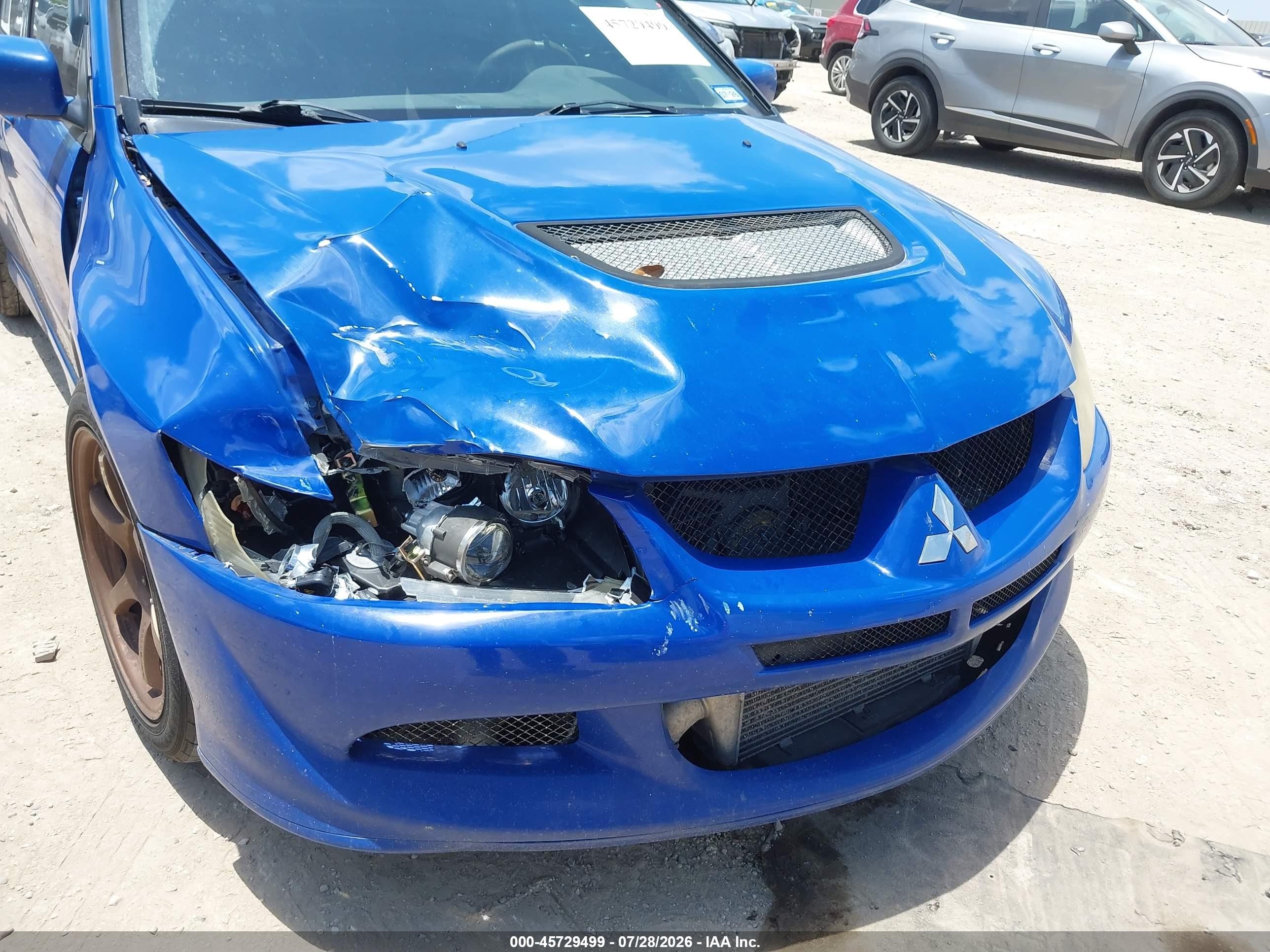 2003 Mitsubishi Lancer Evolution   Blue vin: JA3AH86F73U121000