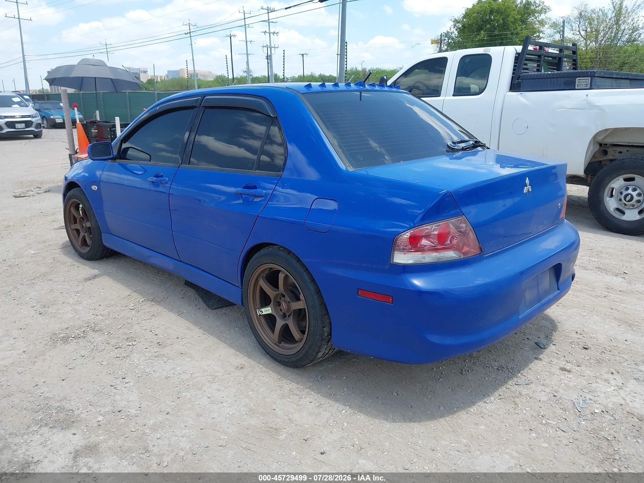 2003 Mitsubishi Lancer Evolution   Blue vin: JA3AH86F73U121000