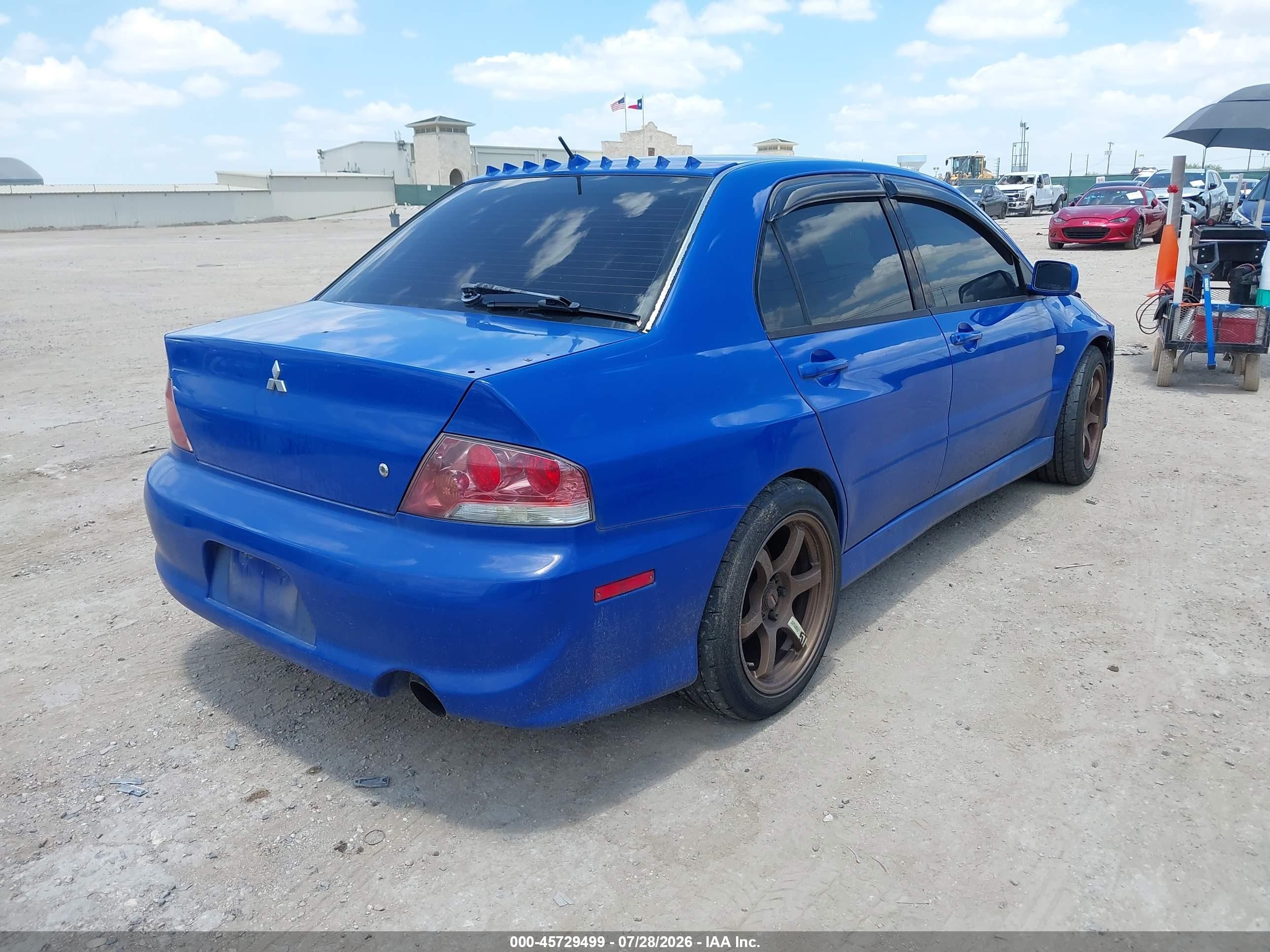 2003 Mitsubishi Lancer Evolution   Blue vin: JA3AH86F73U121000