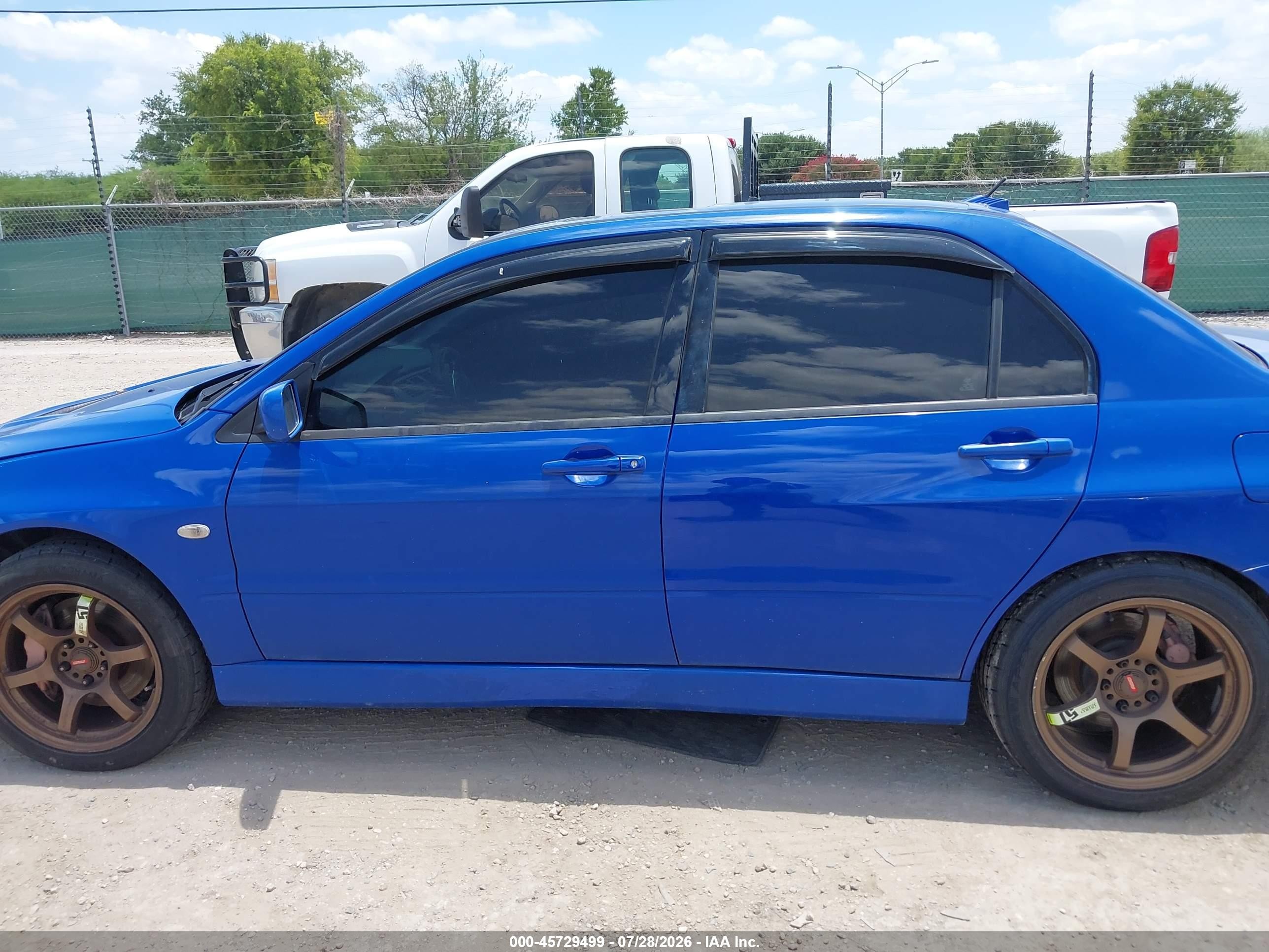 2003 Mitsubishi Lancer Evolution   Blue vin: JA3AH86F73U121000