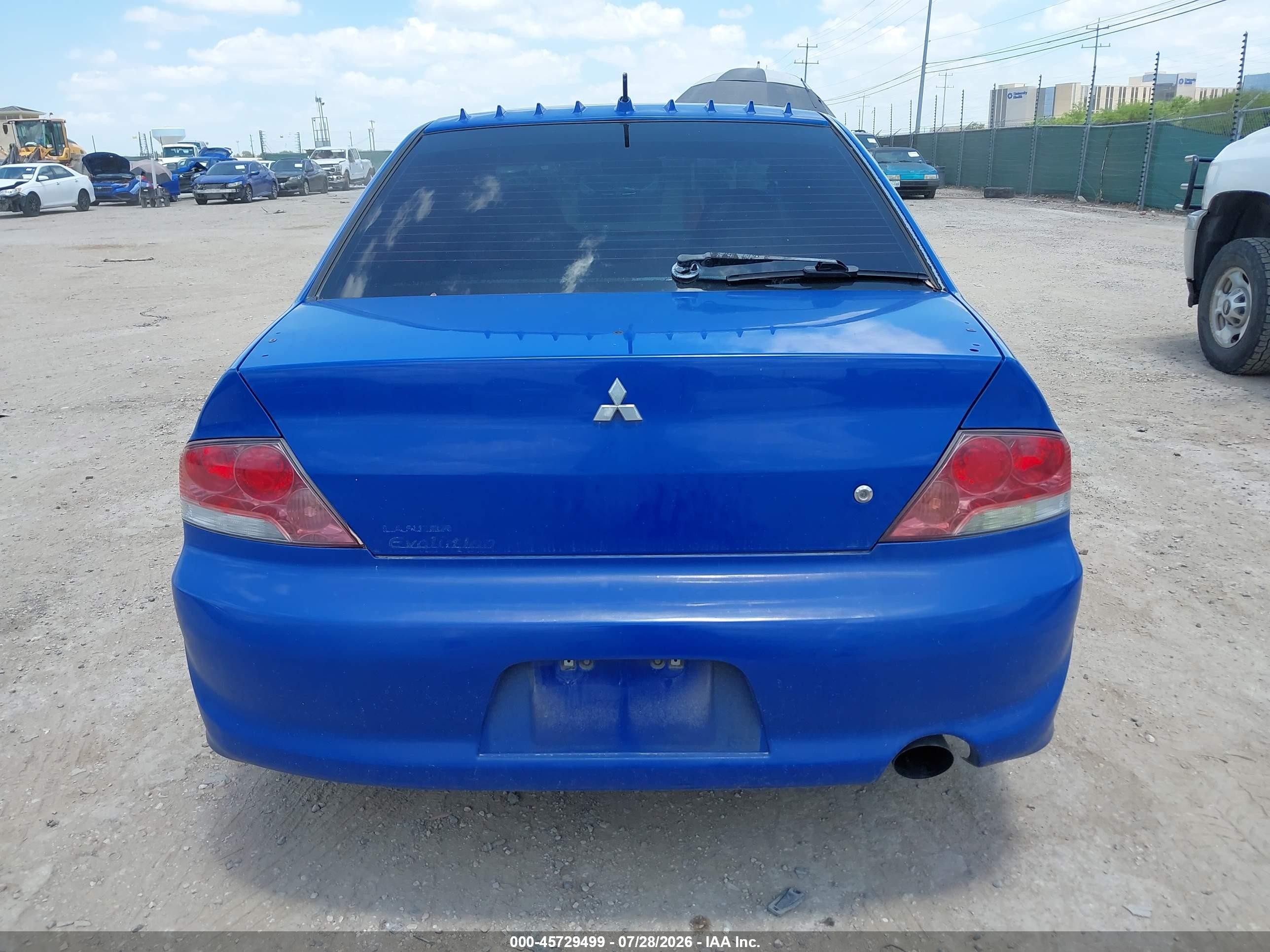 2003 Mitsubishi Lancer Evolution   Blue vin: JA3AH86F73U121000