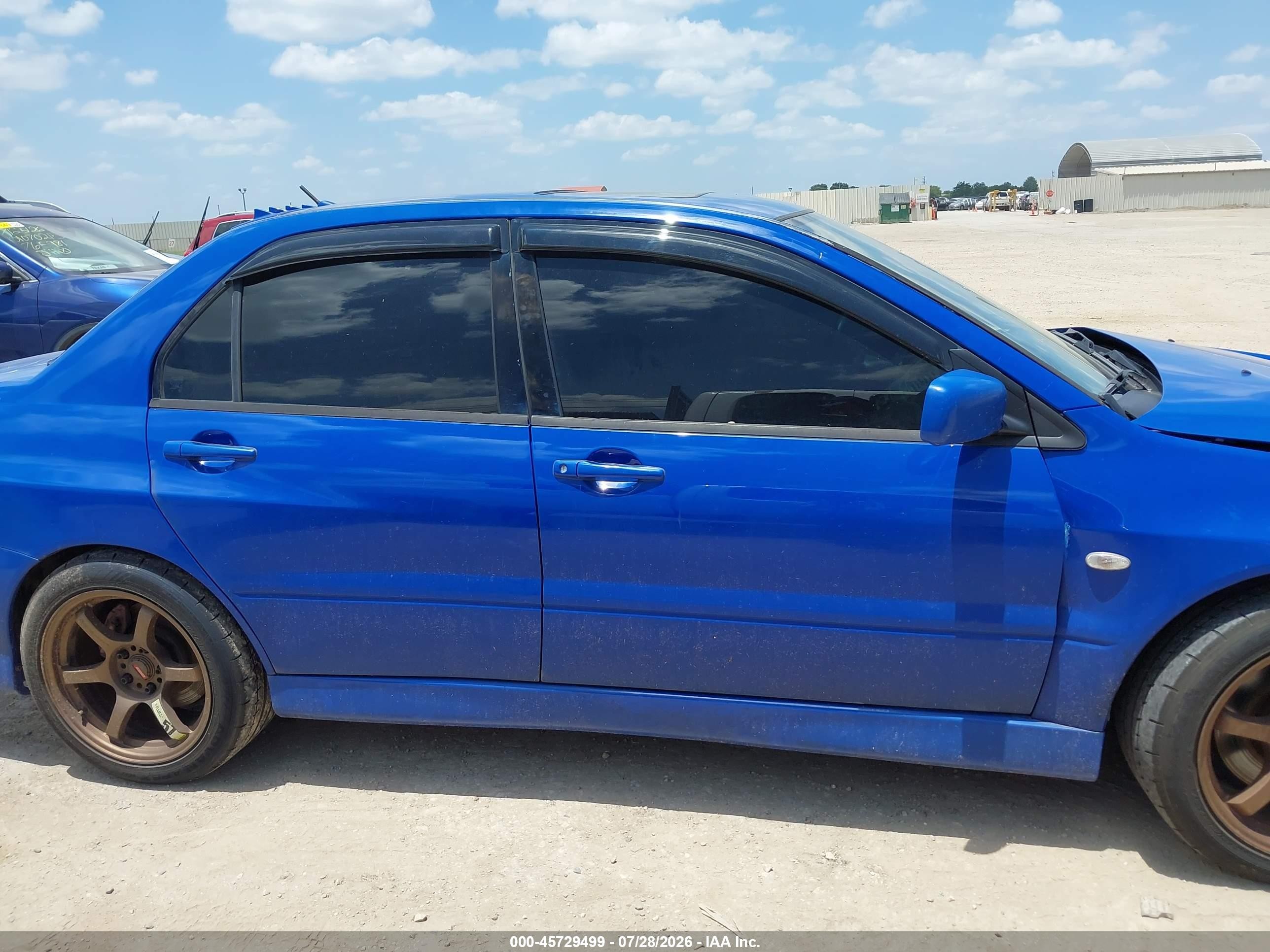 2003 Mitsubishi Lancer Evolution   Blue vin: JA3AH86F73U121000