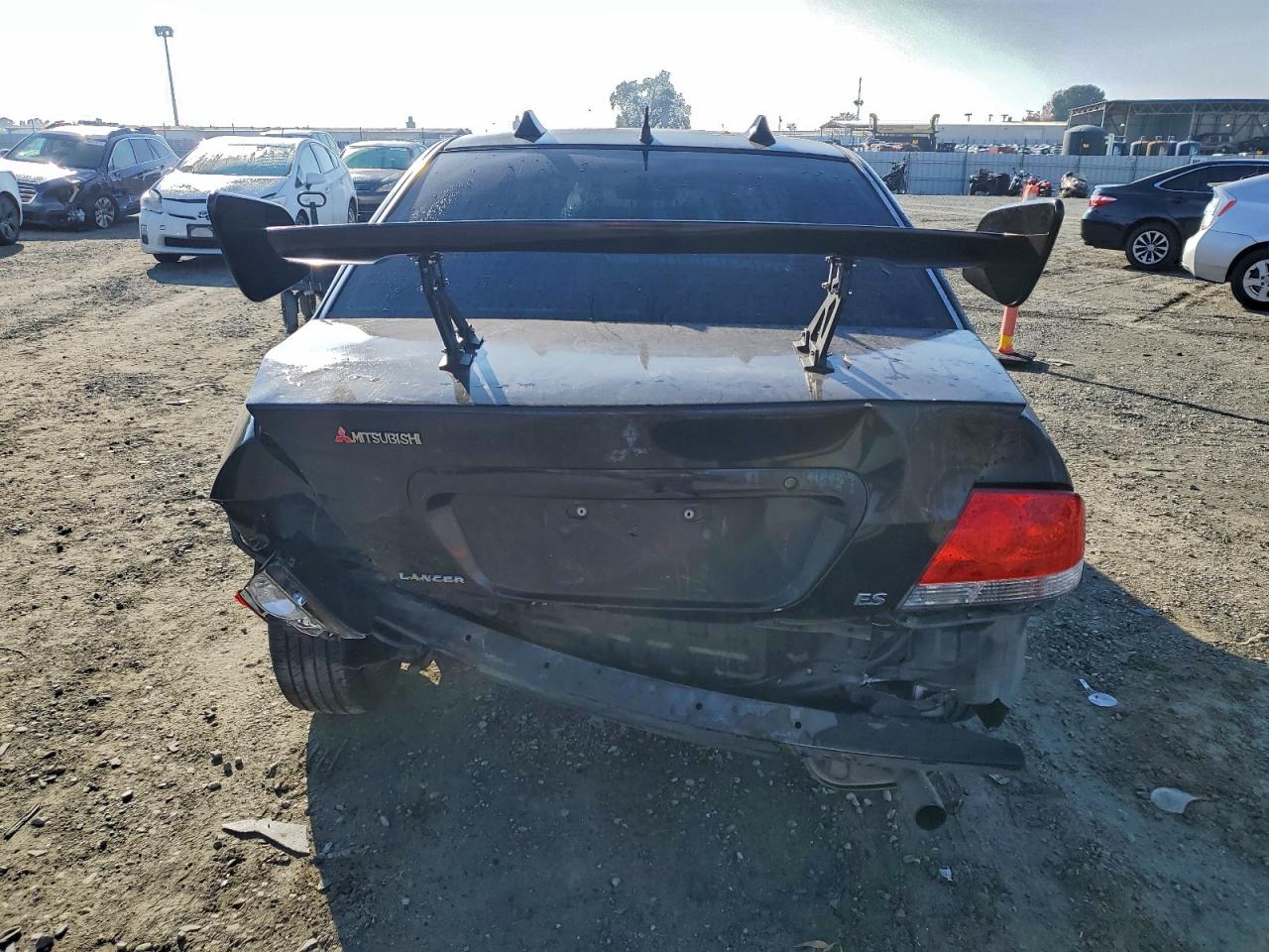 2004 Mitsubishi Lancer Es Black vin: JA3AJ26E14U052041