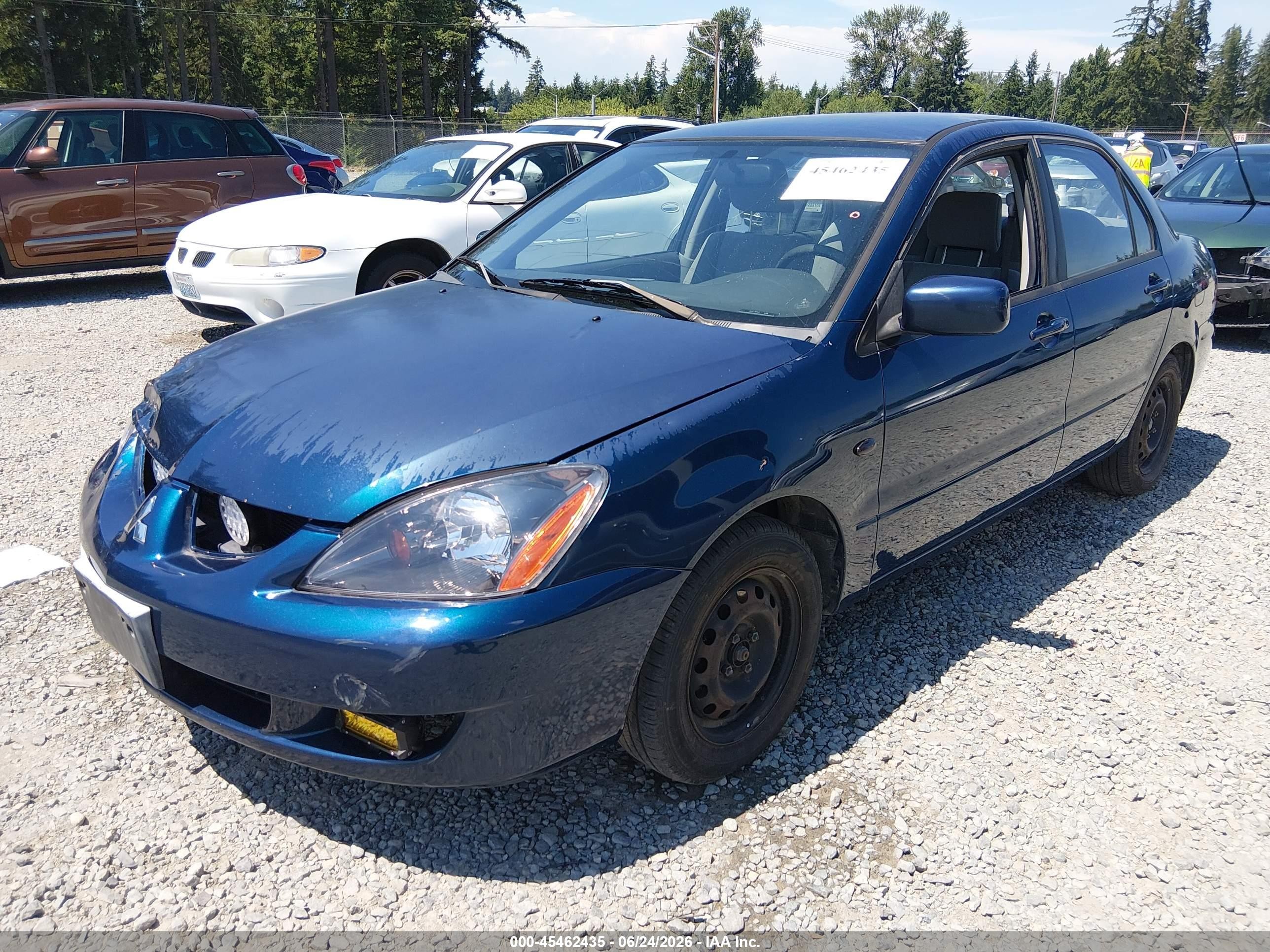 2005 Mitsubishi Lancer Es Blue vin: JA3AJ26E15U016478