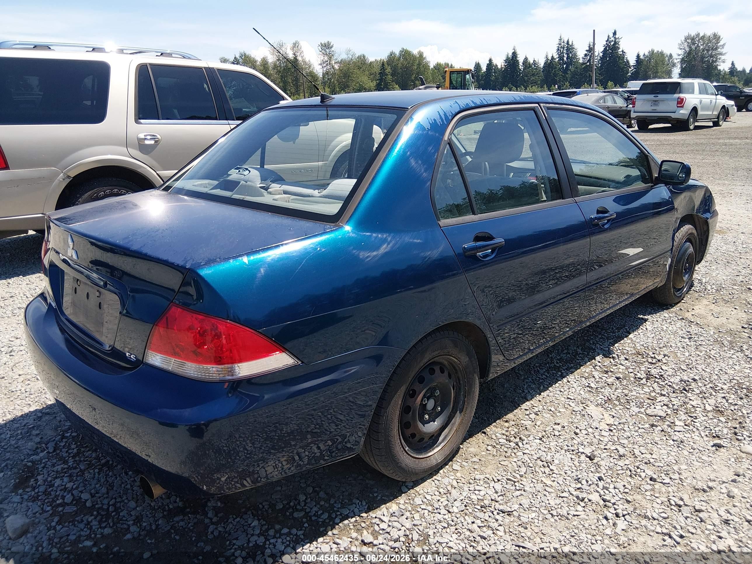 2005 Mitsubishi Lancer Es Blue vin: JA3AJ26E15U016478