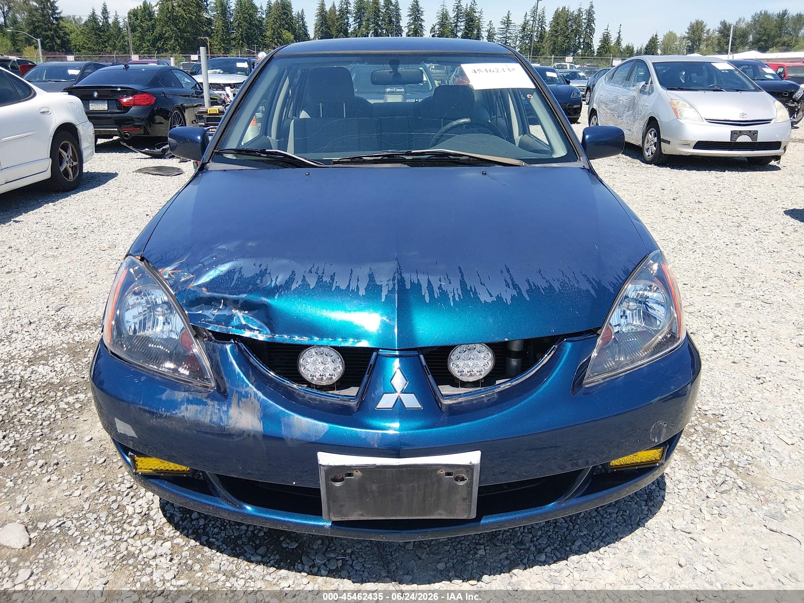 2005 Mitsubishi Lancer Es Blue vin: JA3AJ26E15U016478
