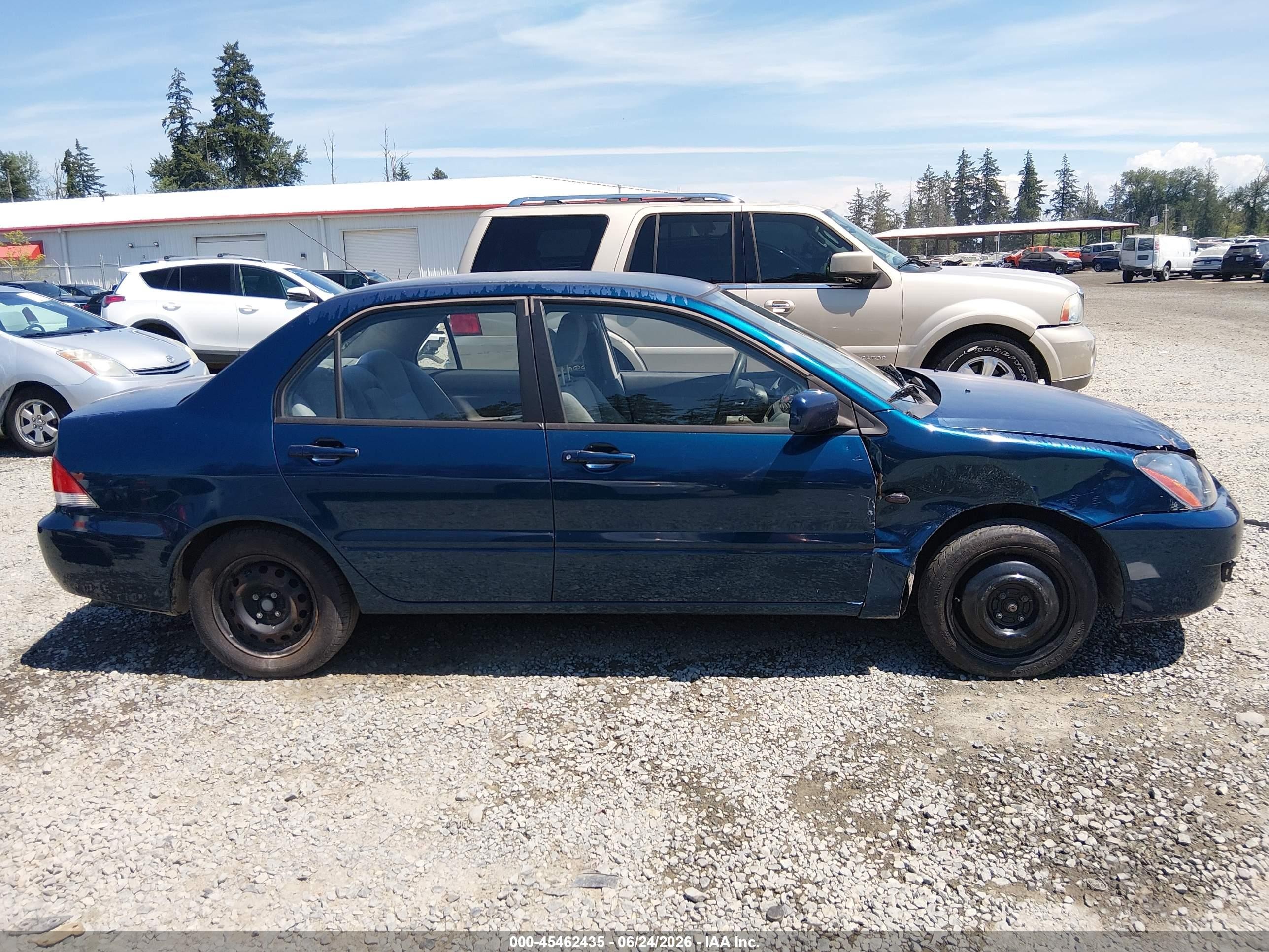 2005 Mitsubishi Lancer Es Blue vin: JA3AJ26E15U016478
