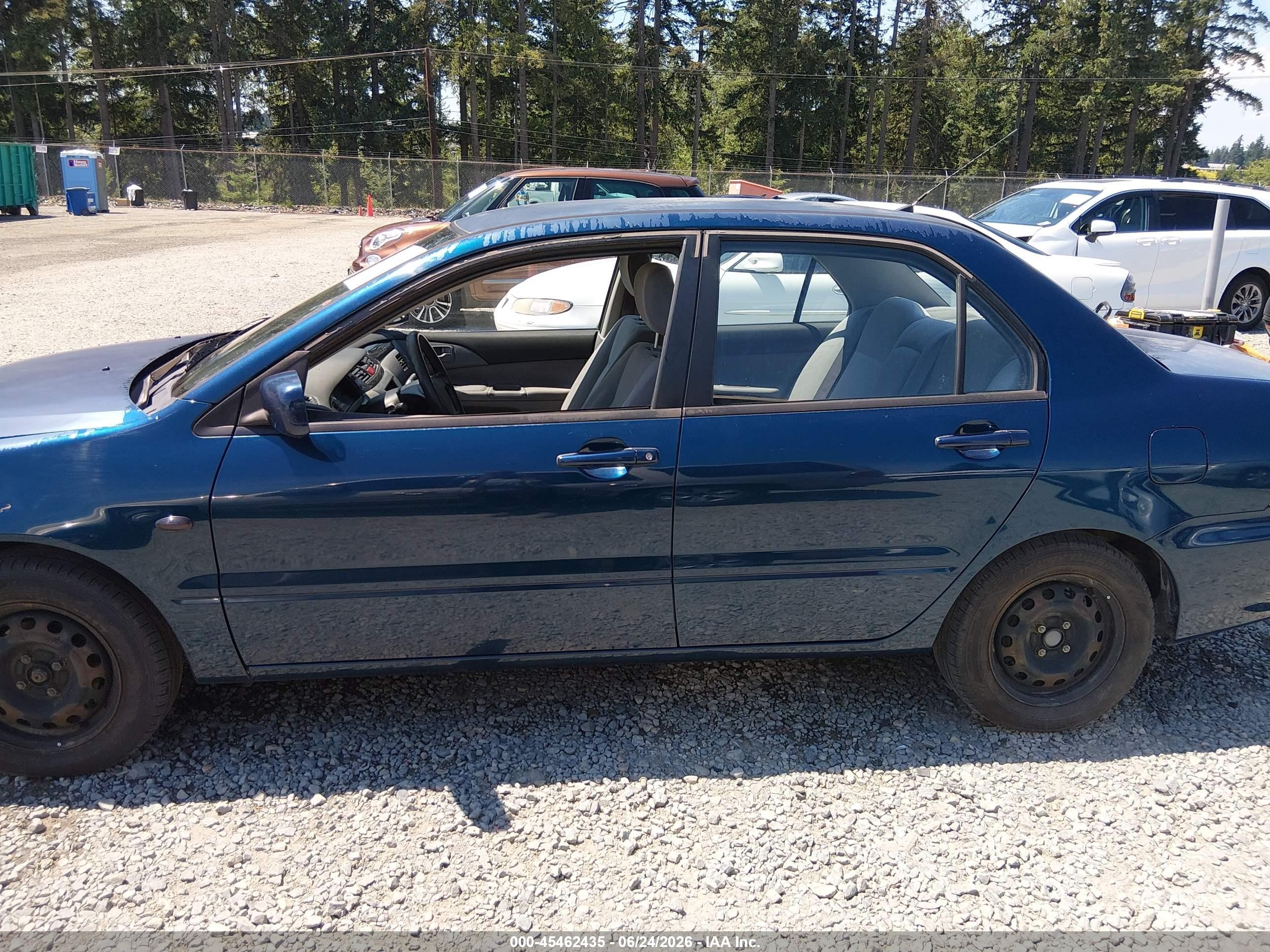 2005 Mitsubishi Lancer Es Blue vin: JA3AJ26E15U016478