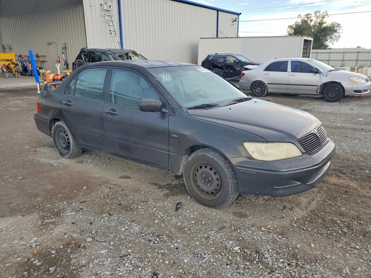 2003 Mitsubishi Lancer Es Black vin: JA3AJ26E43U025432