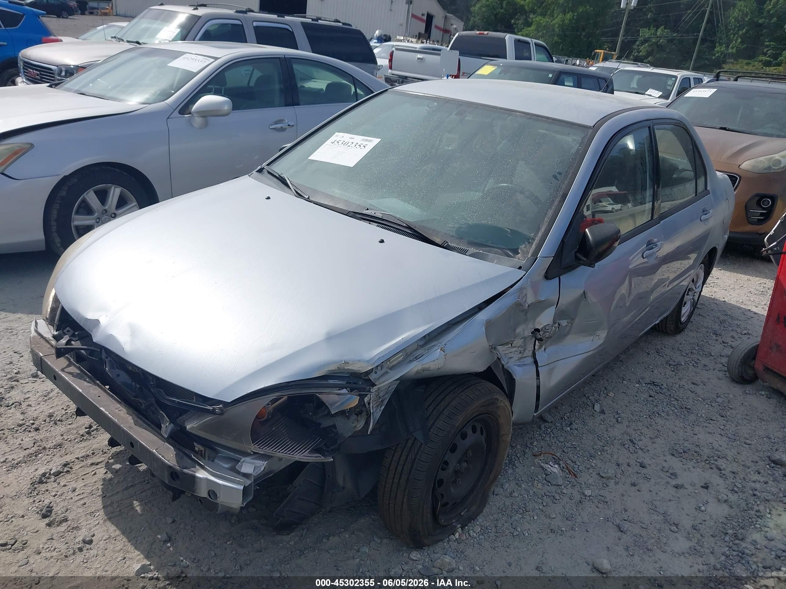 2004 Mitsubishi Lancer Es Silver vin: JA3AJ26E44U030938