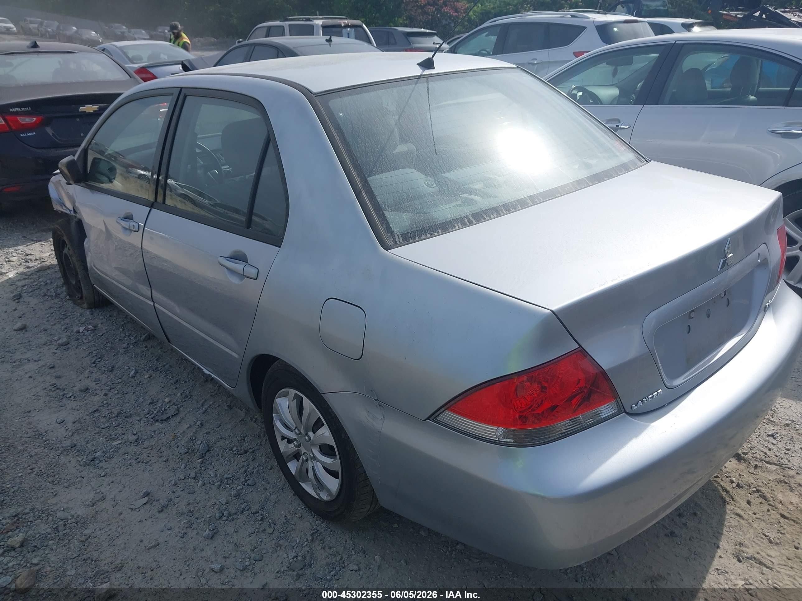 2004 Mitsubishi Lancer Es Silver vin: JA3AJ26E44U030938