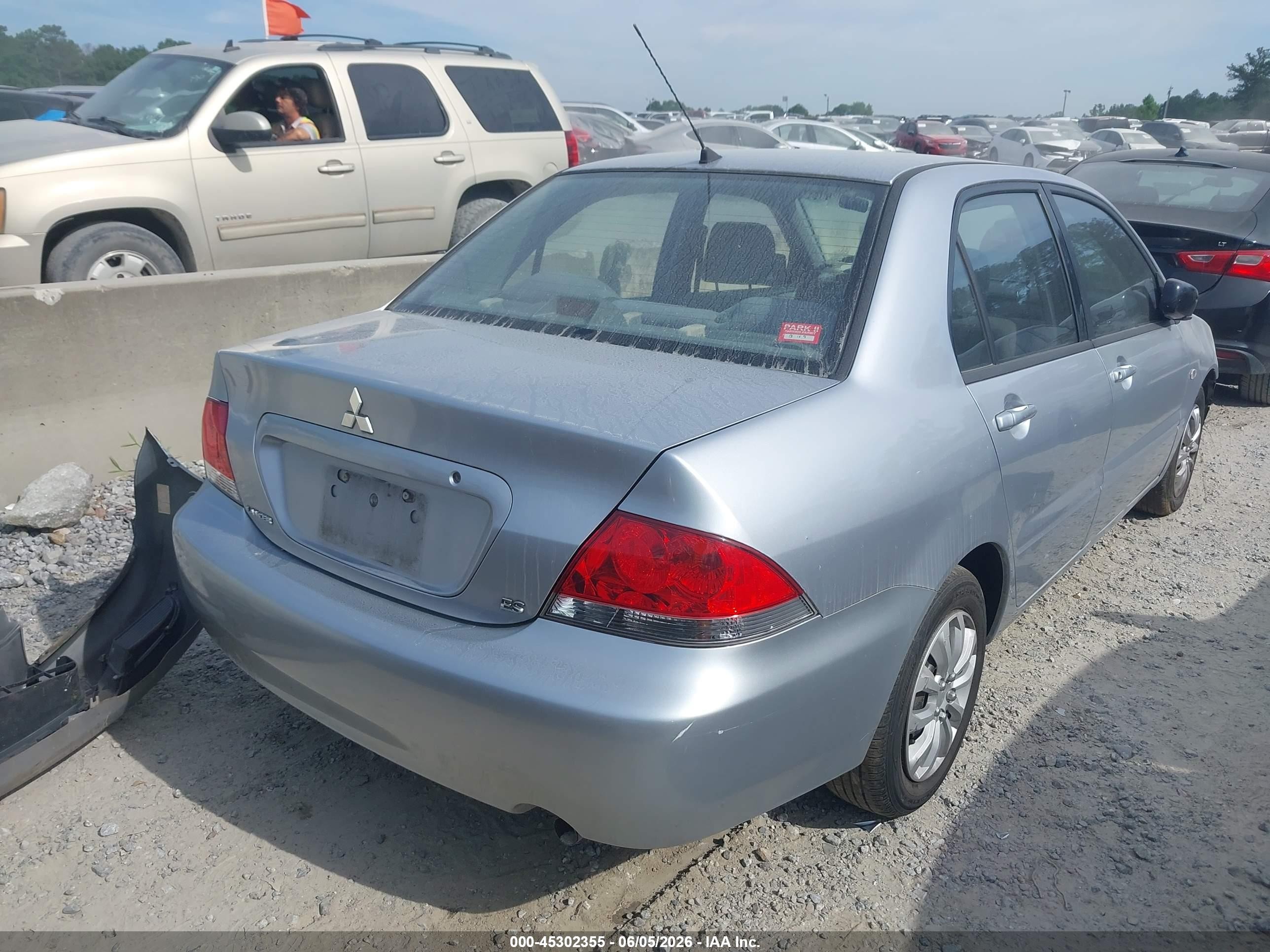 2004 Mitsubishi Lancer Es Silver vin: JA3AJ26E44U030938