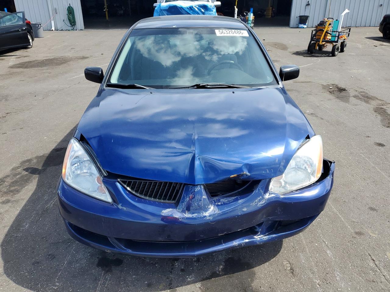 2004 Mitsubishi Lancer Es Blue vin: JA3AJ26E64U016667