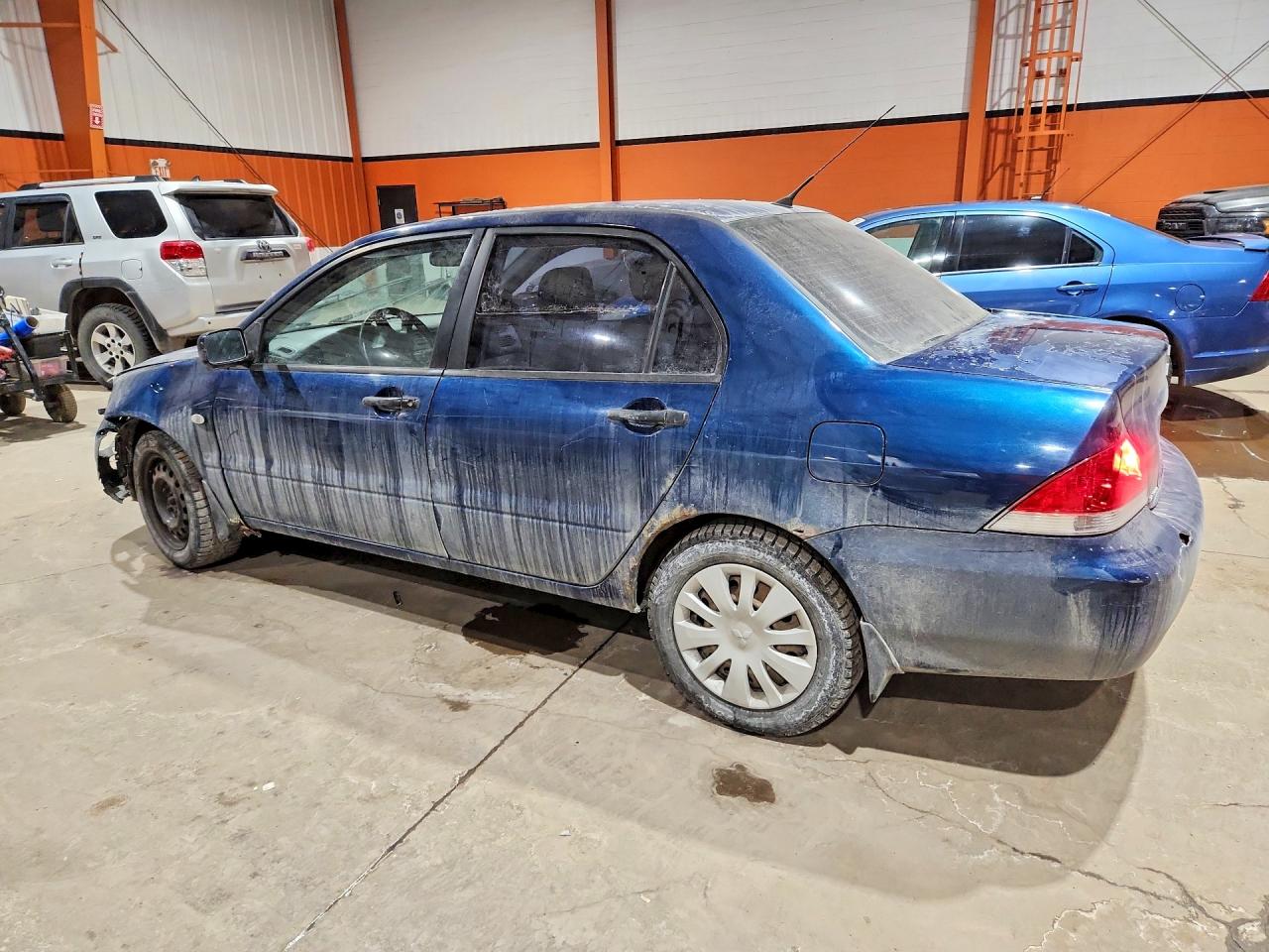 2006 Mitsubishi Lancer Es Blue vin: JA3AJ26E76U601051