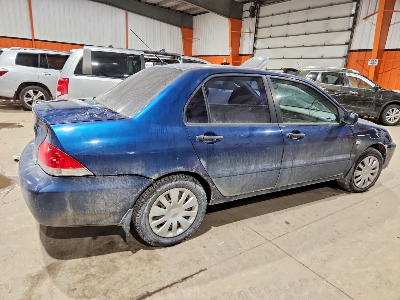 2006 Mitsubishi Lancer Es Blue vin: JA3AJ26E76U601051