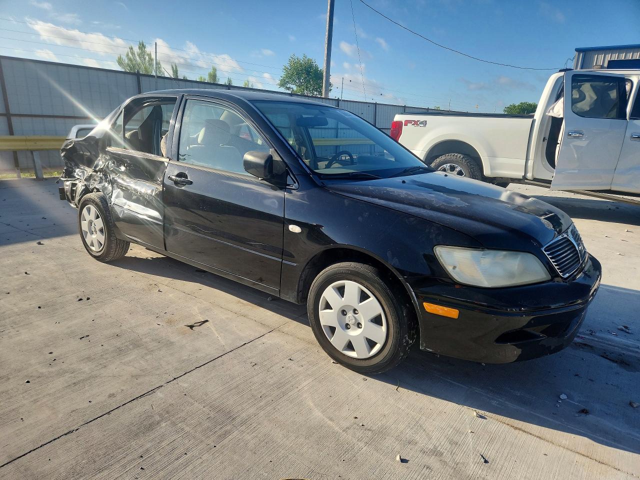 2002 Mitsubishi Lancer Es Black vin: JA3AJ26E92U077251