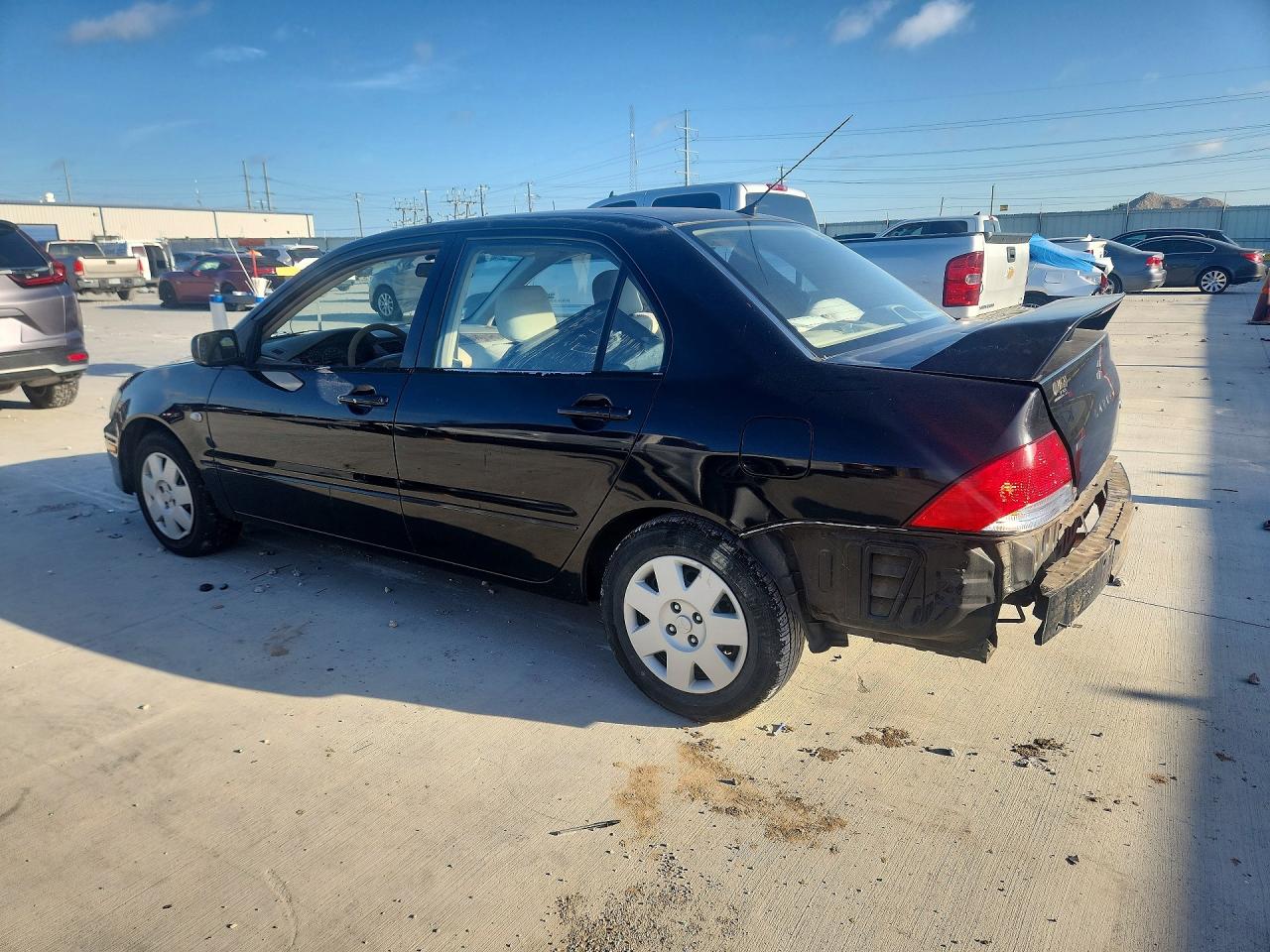 2002 Mitsubishi Lancer Es Black vin: JA3AJ26E92U077251
