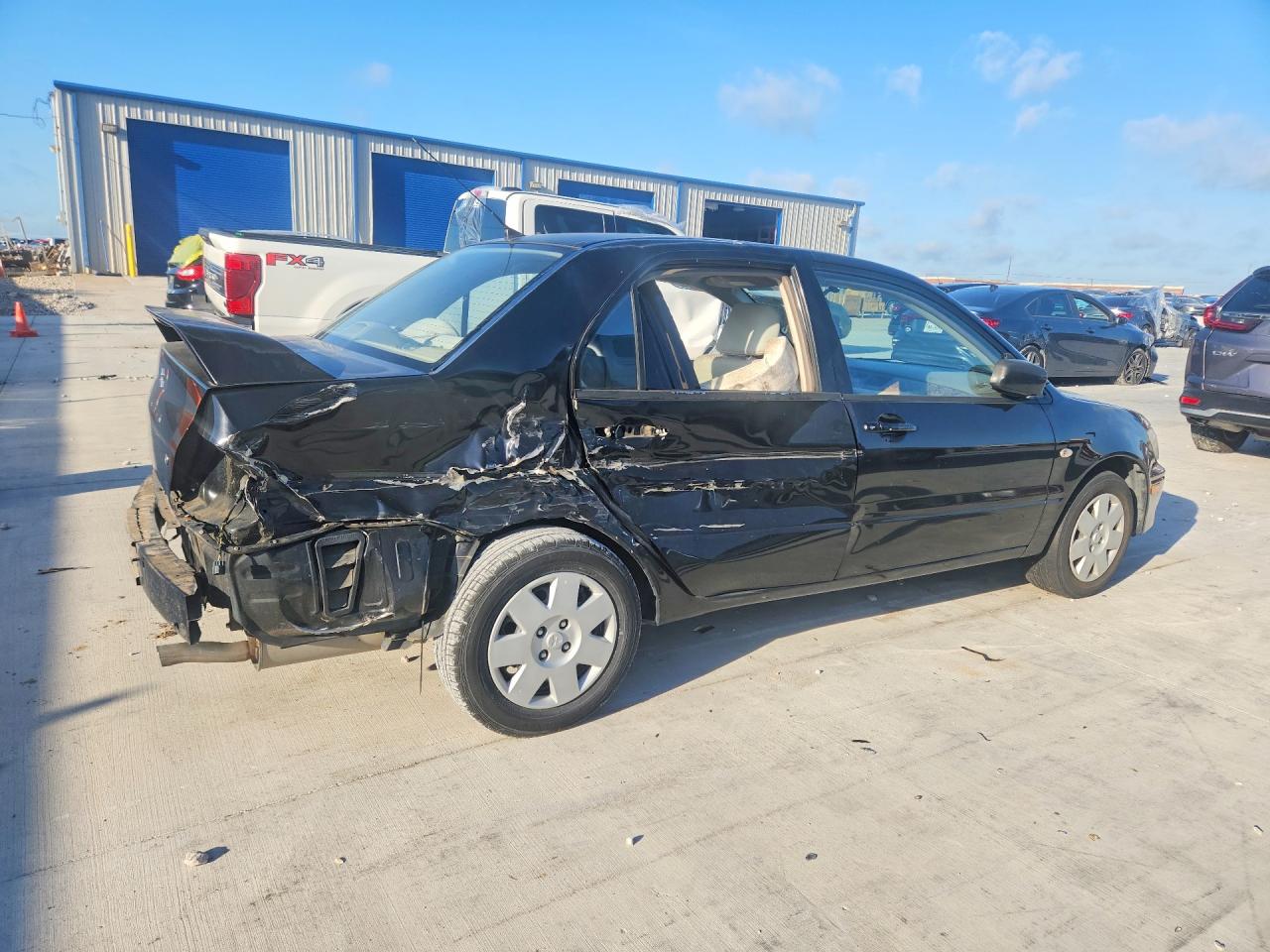2002 Mitsubishi Lancer Es Black vin: JA3AJ26E92U077251