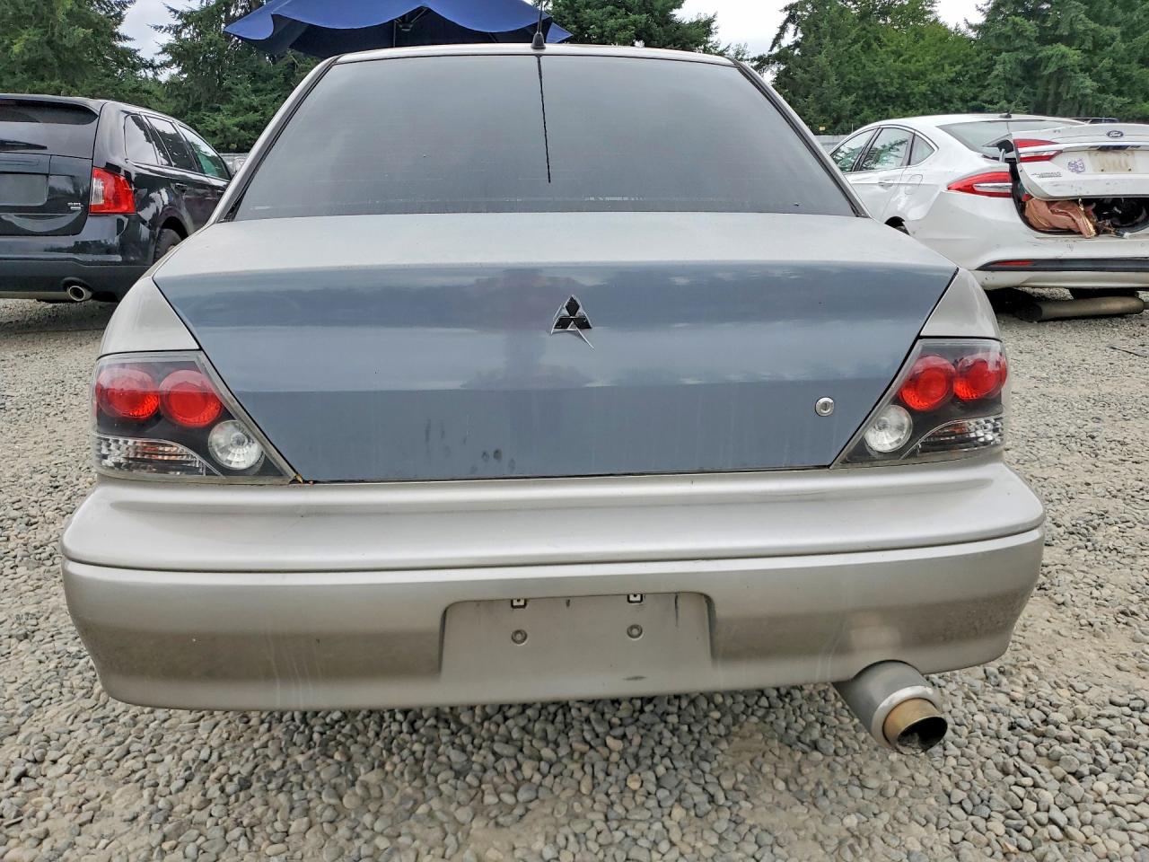 2003 Mitsubishi Lancer Es Silver vin: JA3AJ26EX3U008876