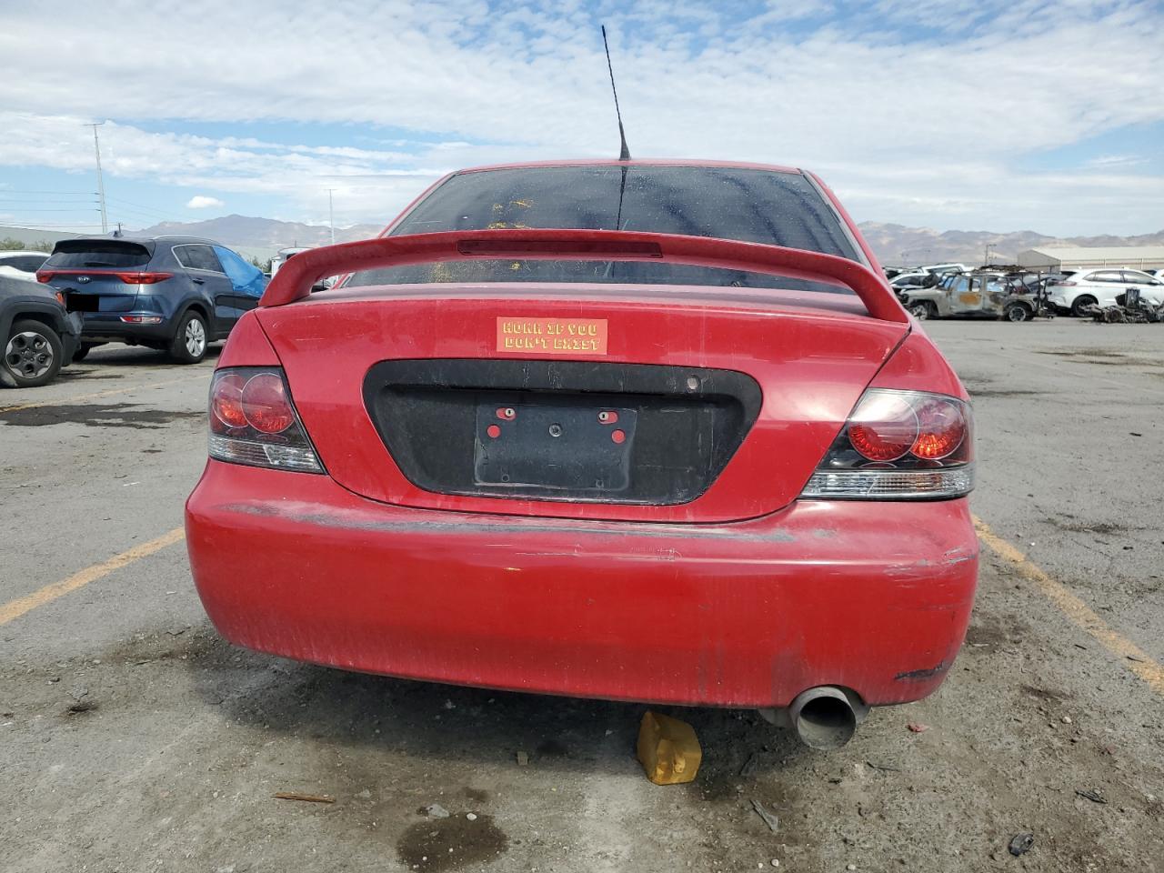 2005 Mitsubishi Lancer Oz Rally Red vin: JA3AJ86E05U030245