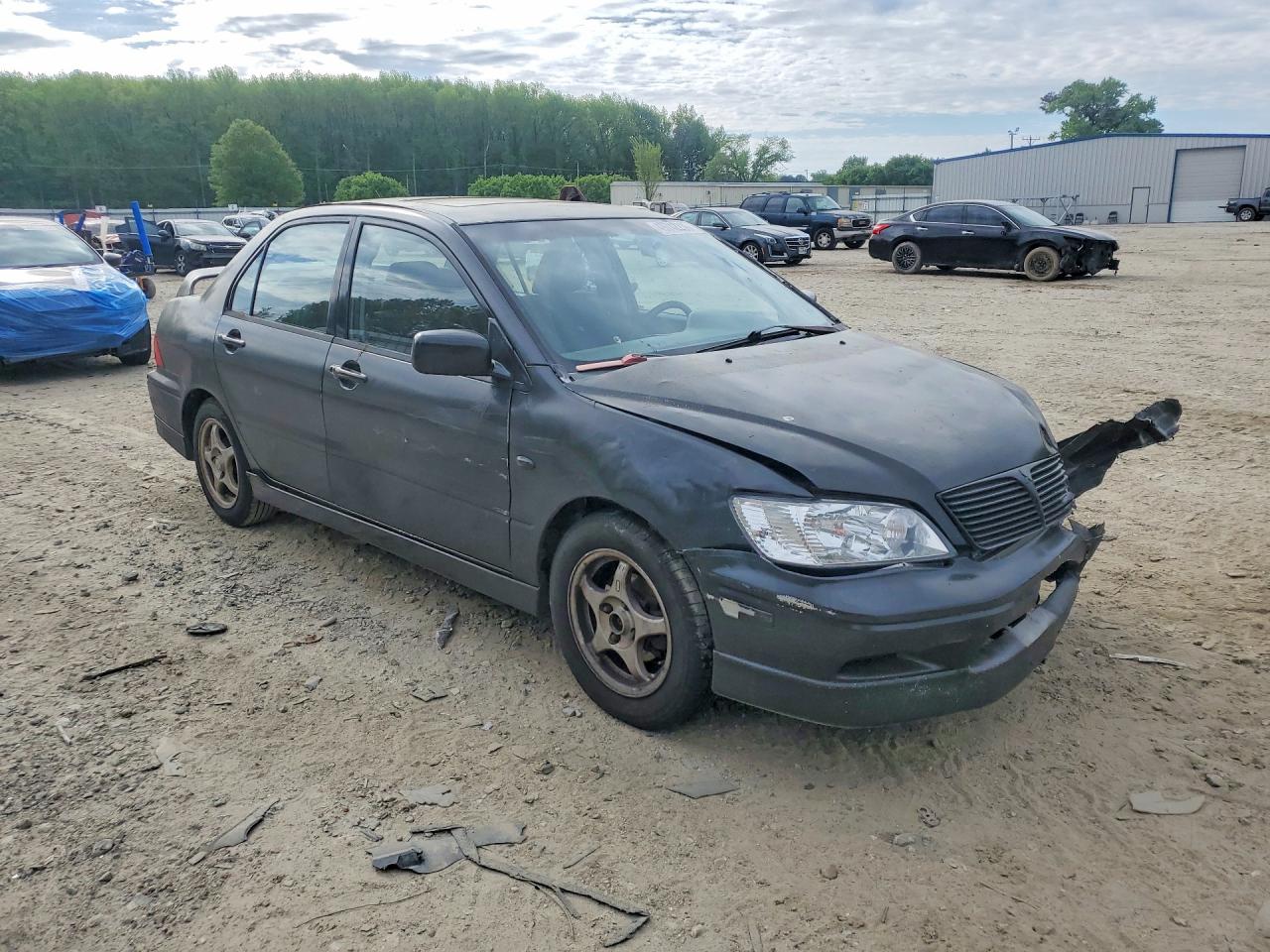 2003 Mitsubishi Lancer Oz Rally Черный vin: JA3AJ86E23U116413