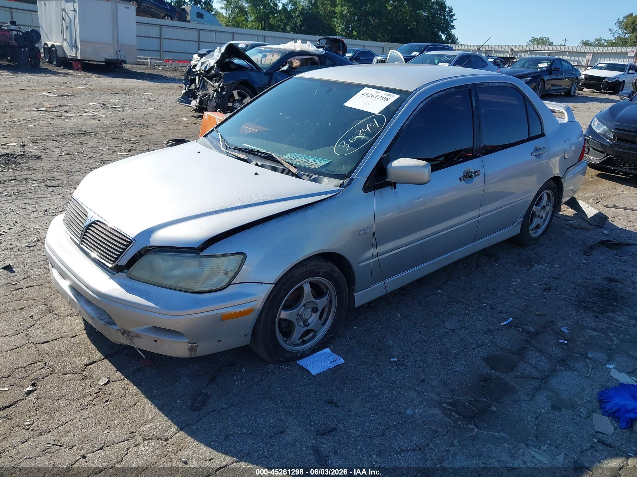2003 Mitsubishi Lancer Oz Rally Серебряный vin: JA3AJ86E33U024078