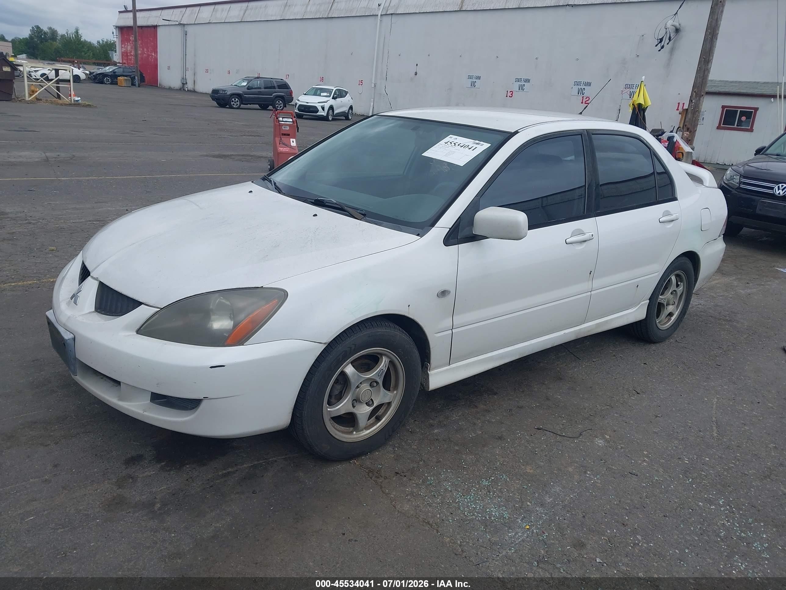 2004 Mitsubishi Lancer Oz Rally White vin: JA3AJ86E34U021070