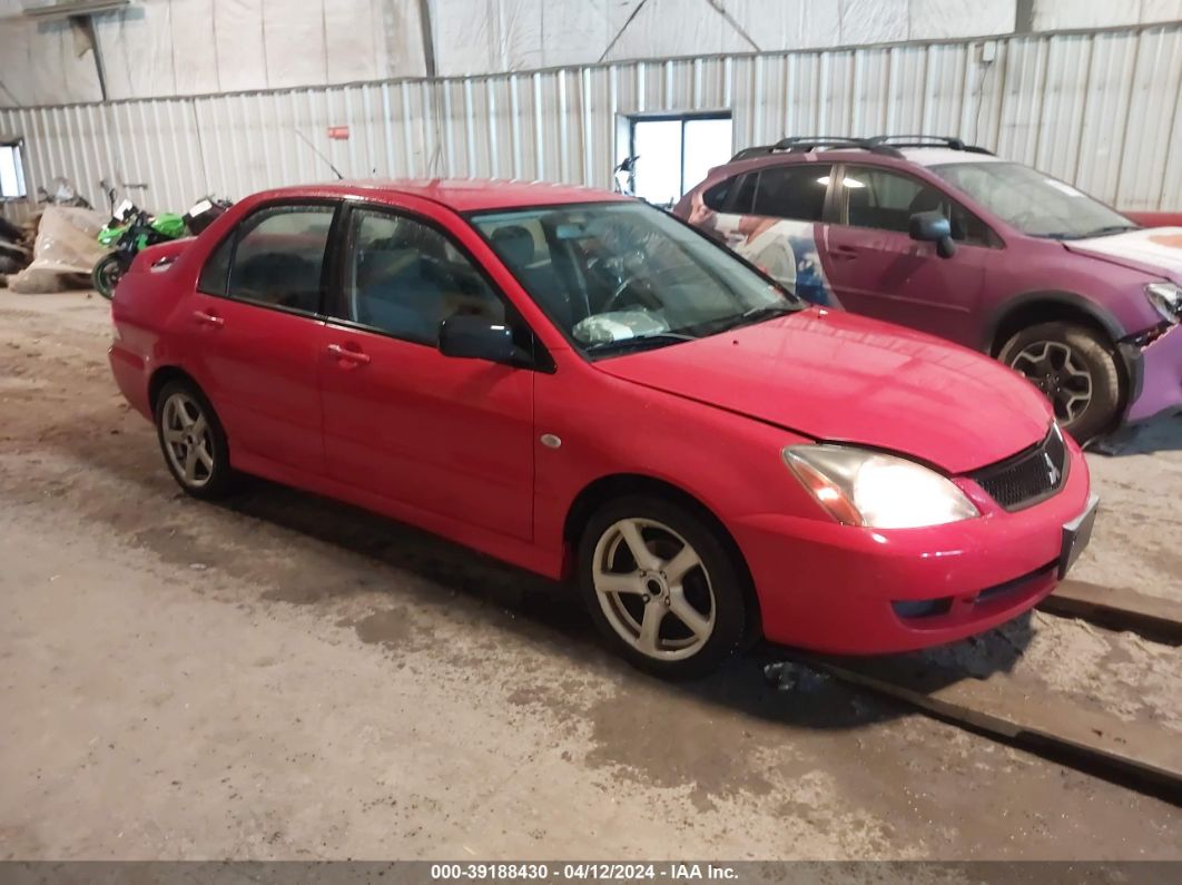 Price & History 2006 Mitsubishi Lancer Oz Rally 2.0l I-4 120hp vin