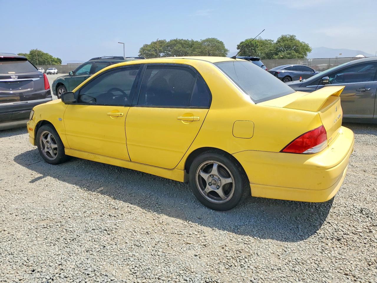 2003 Mitsubishi Lancer Oz Rally Желтый vin: JA3AJ86E53U094522