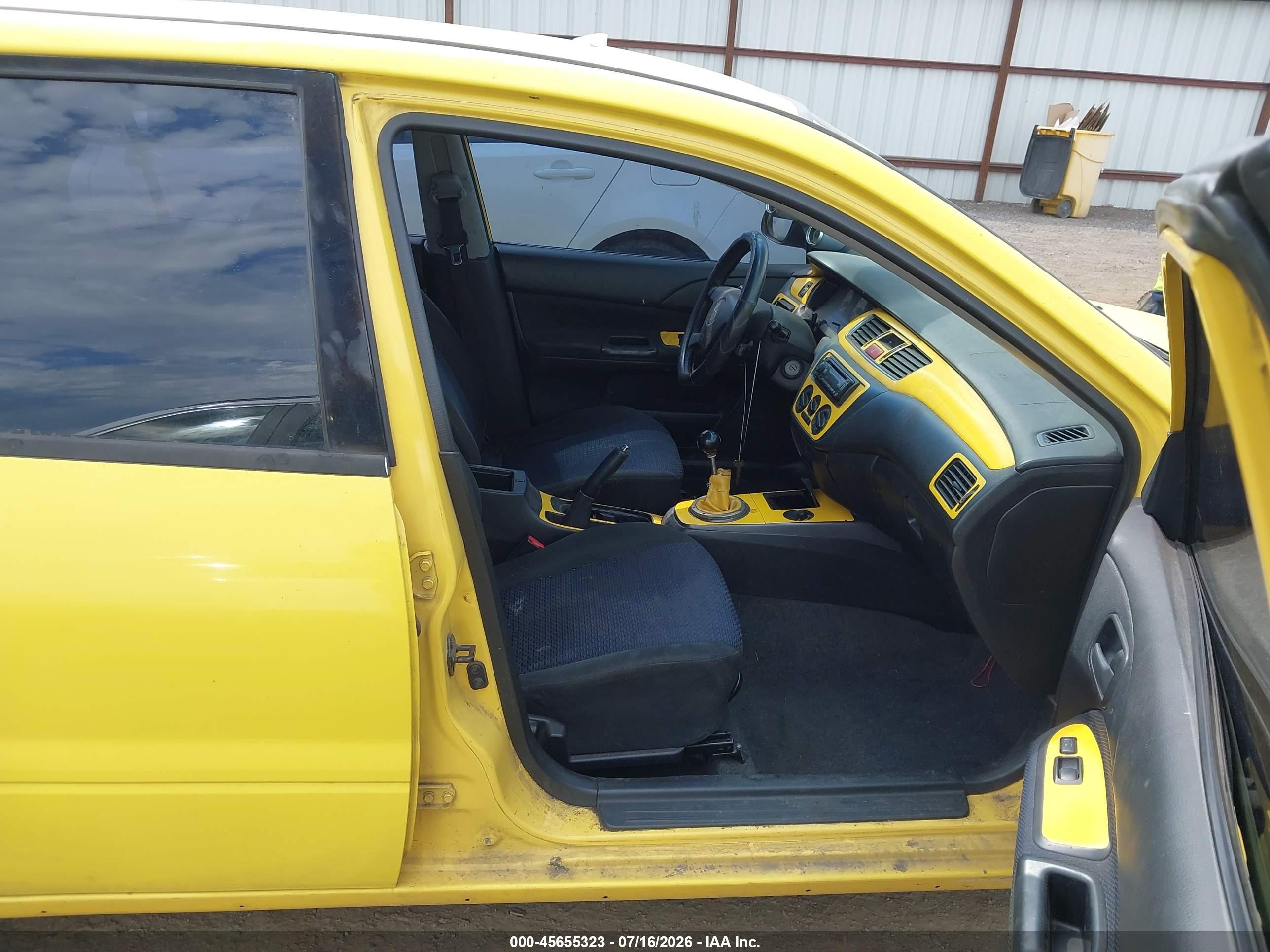 2002 Mitsubishi Lancer Oz Rally Yellow vin: JA3AJ86E82U067717