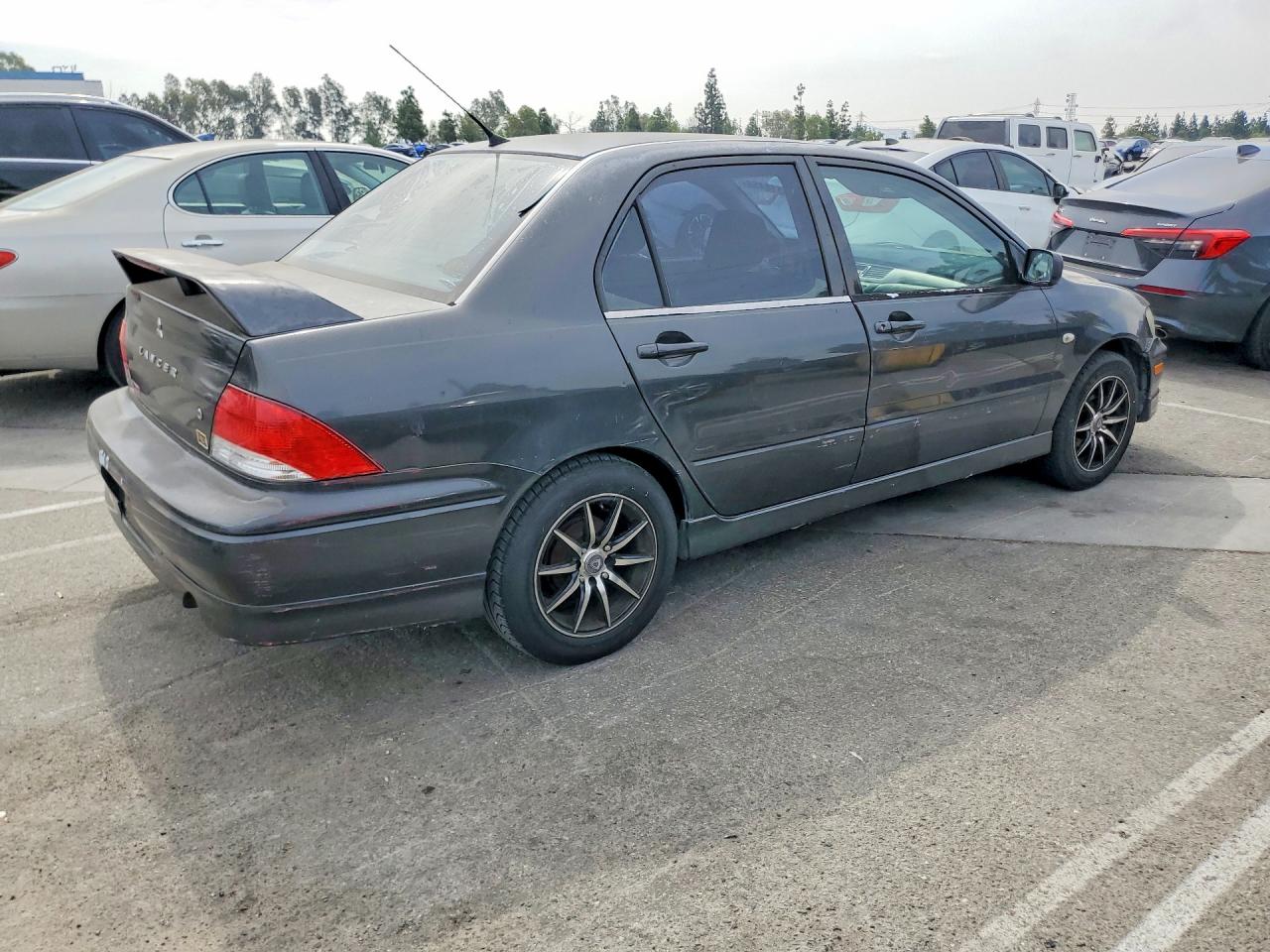 2003 Mitsubishi Lancer Oz Rally Black vin: JA3AJ86E93U121673