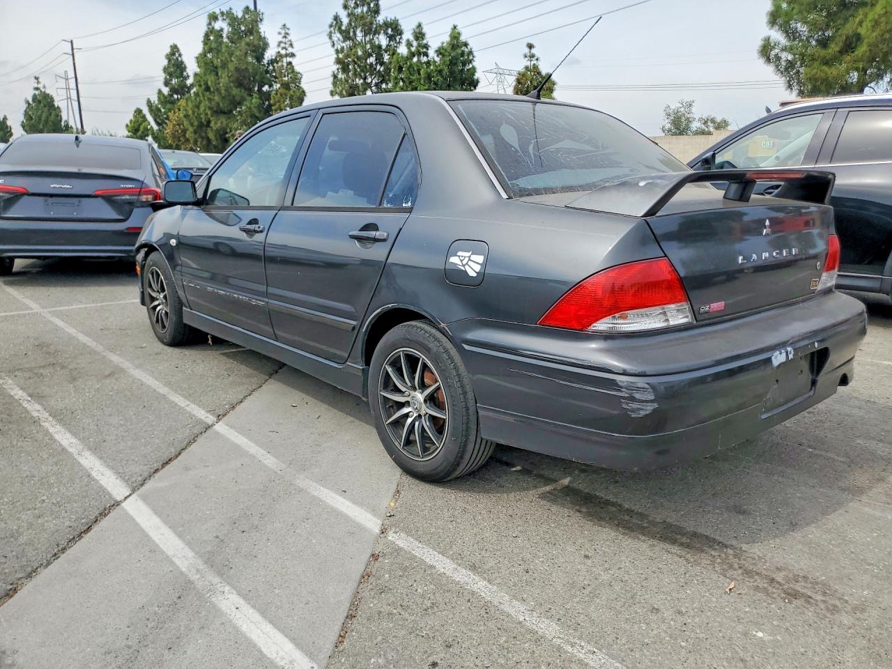 2003 Mitsubishi Lancer Oz Rally Black vin: JA3AJ86E93U121673