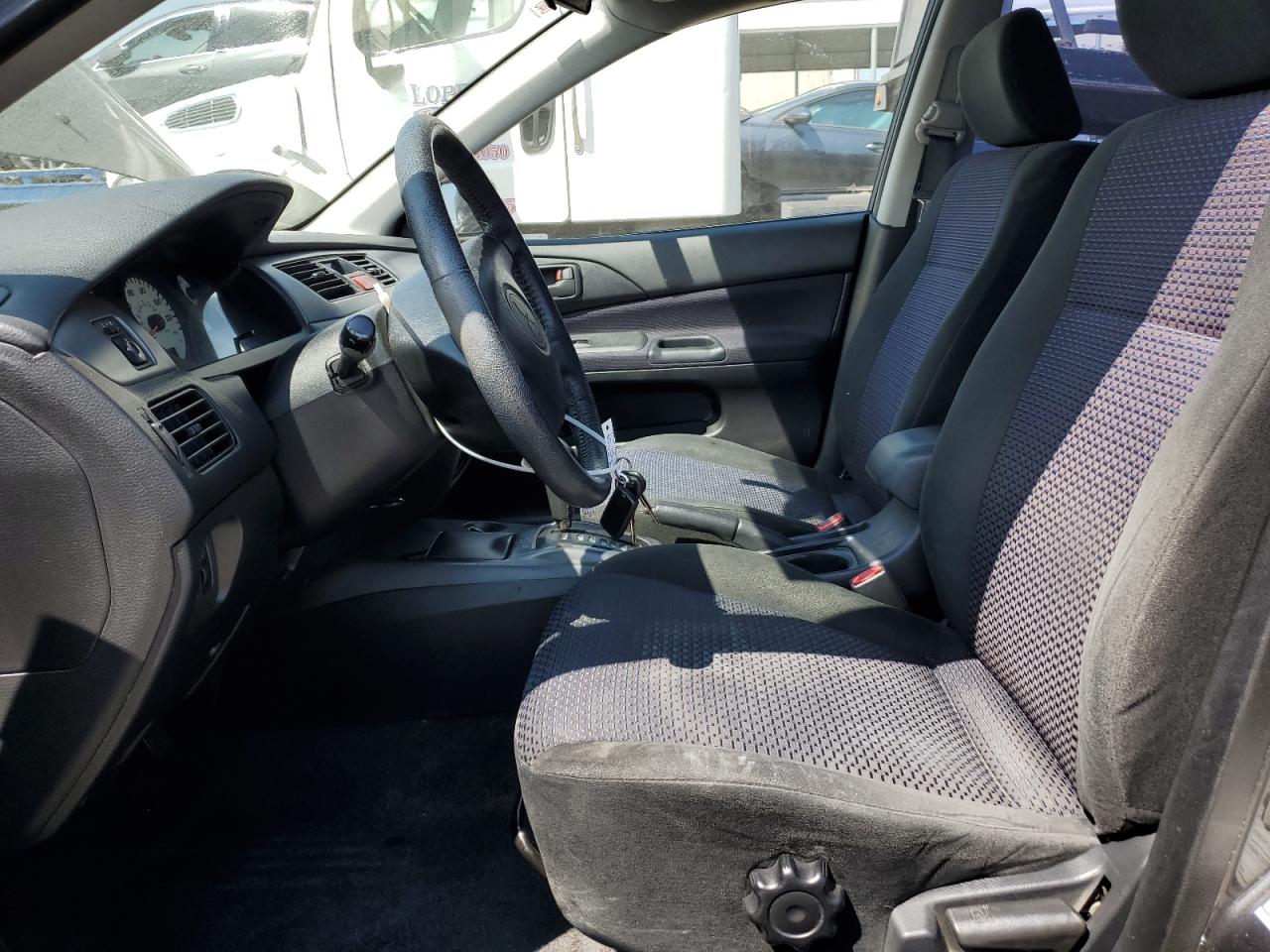 Price & History 2002 Mitsubishi Lancer Oz Rally 2.0l 4 vin