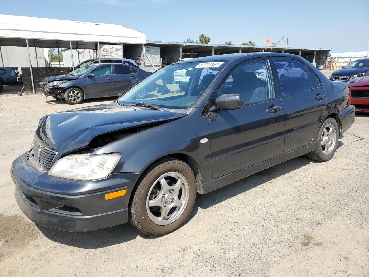 Price & History 2002 Mitsubishi Lancer Oz Rally 2.0l 4 vin