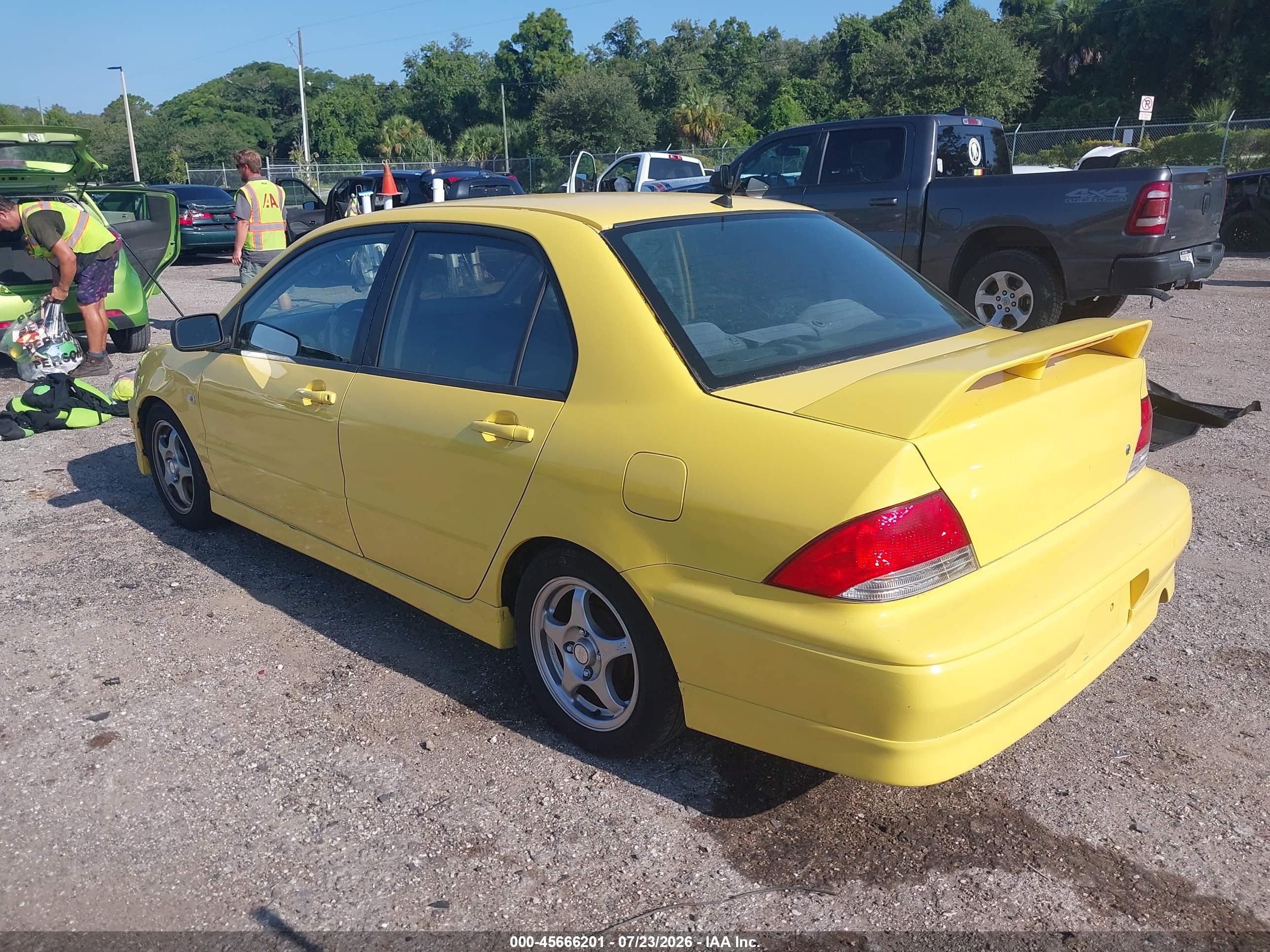 2002 Mitsubishi Lancer Oz Rally Yellow vin: JA3AJ86EX2U082509