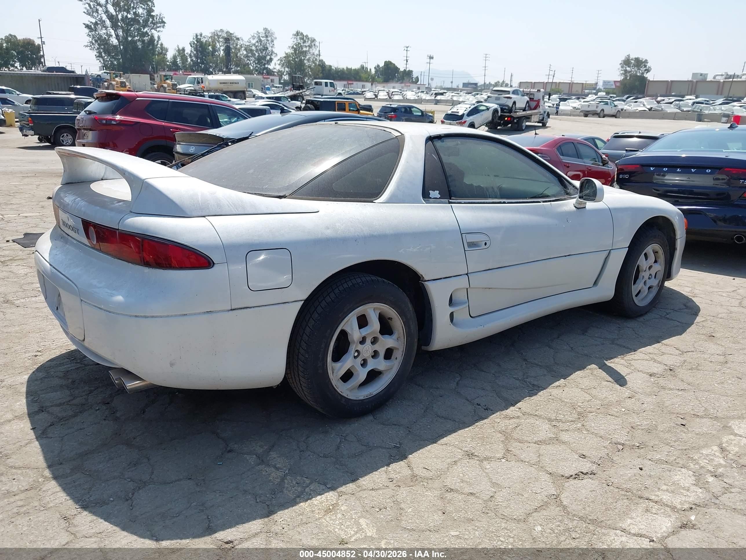 1998 Mitsubishi 3000 Gt   White vin: JA3AM44H1WY000839