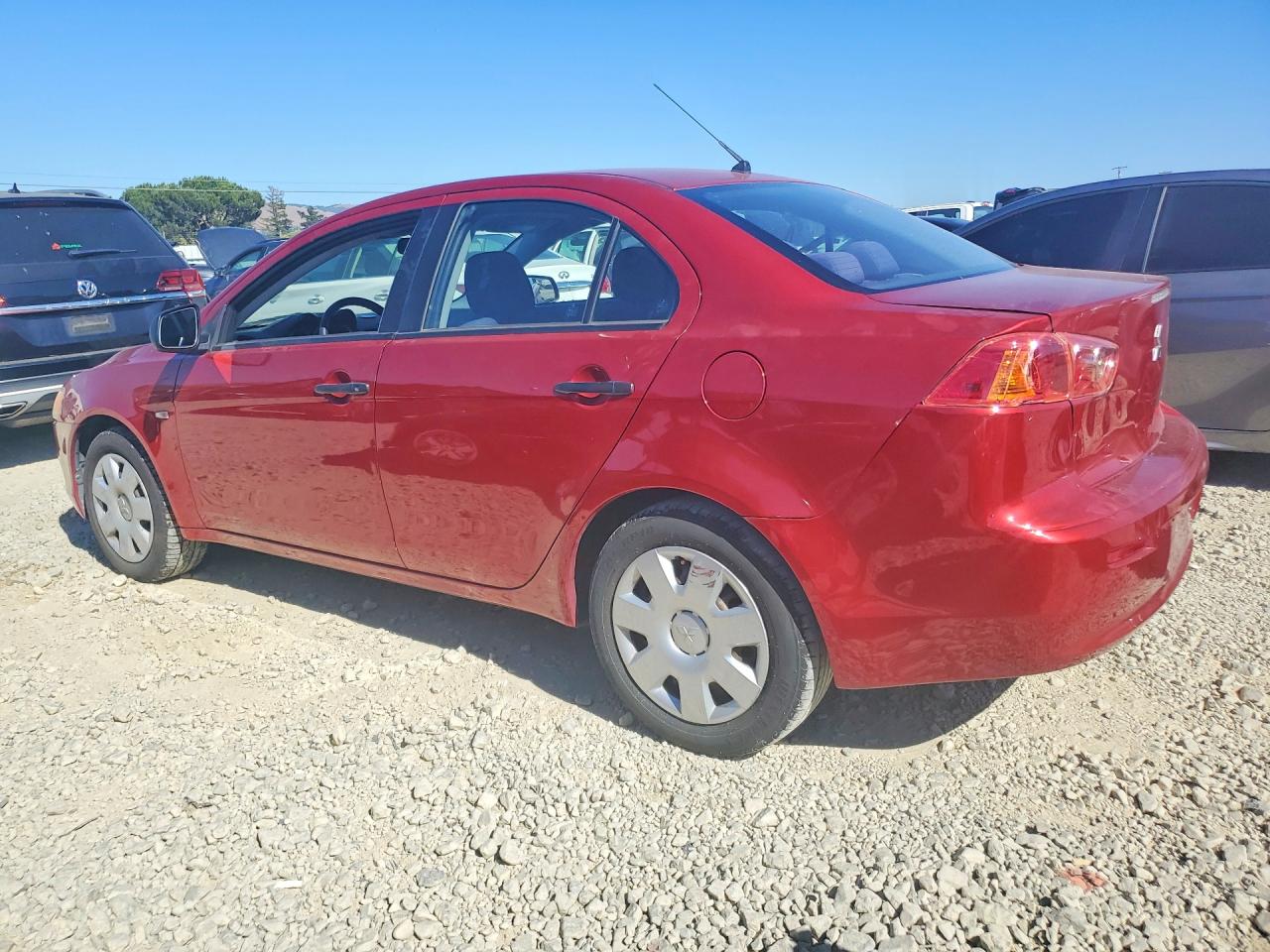 2009 Mitsubishi Lancer De Red vin: JA3AU16UX9U003940