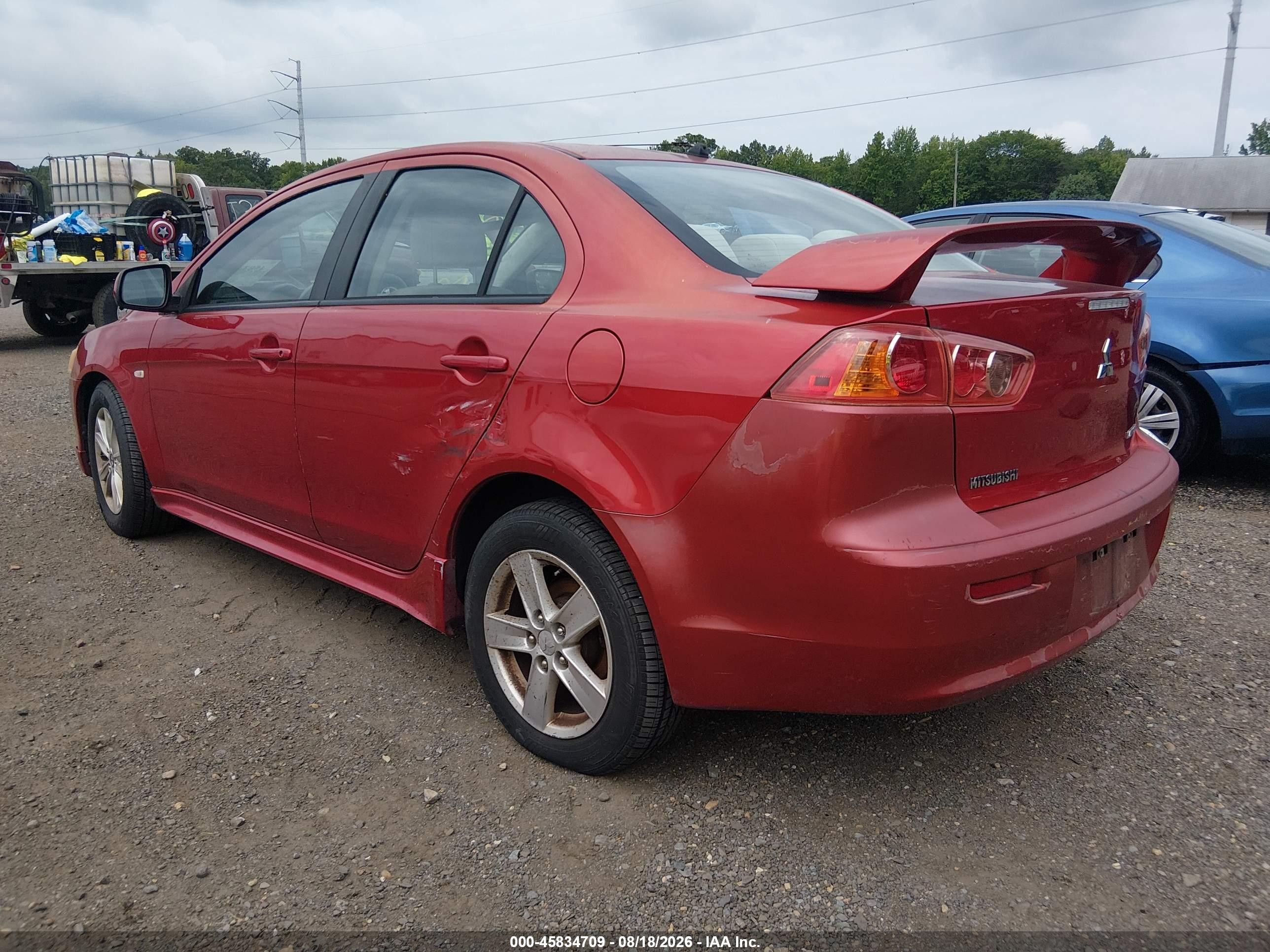 2009 Mitsubishi Lancer   Red vin: JA3AU26U09U029873
