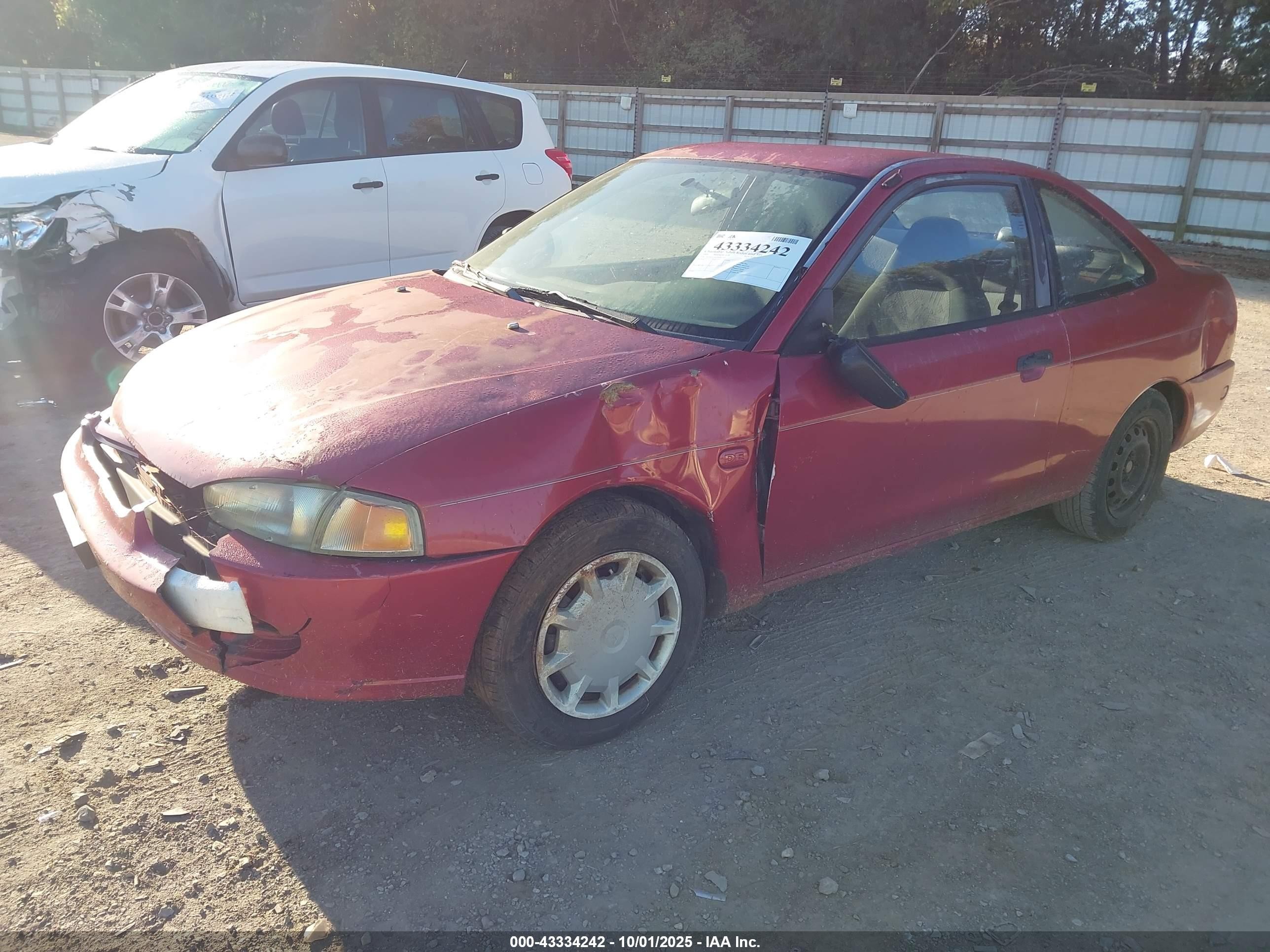 2001 Mitsubishi Mirage De Maroon vin: JA3AY11A11U027680