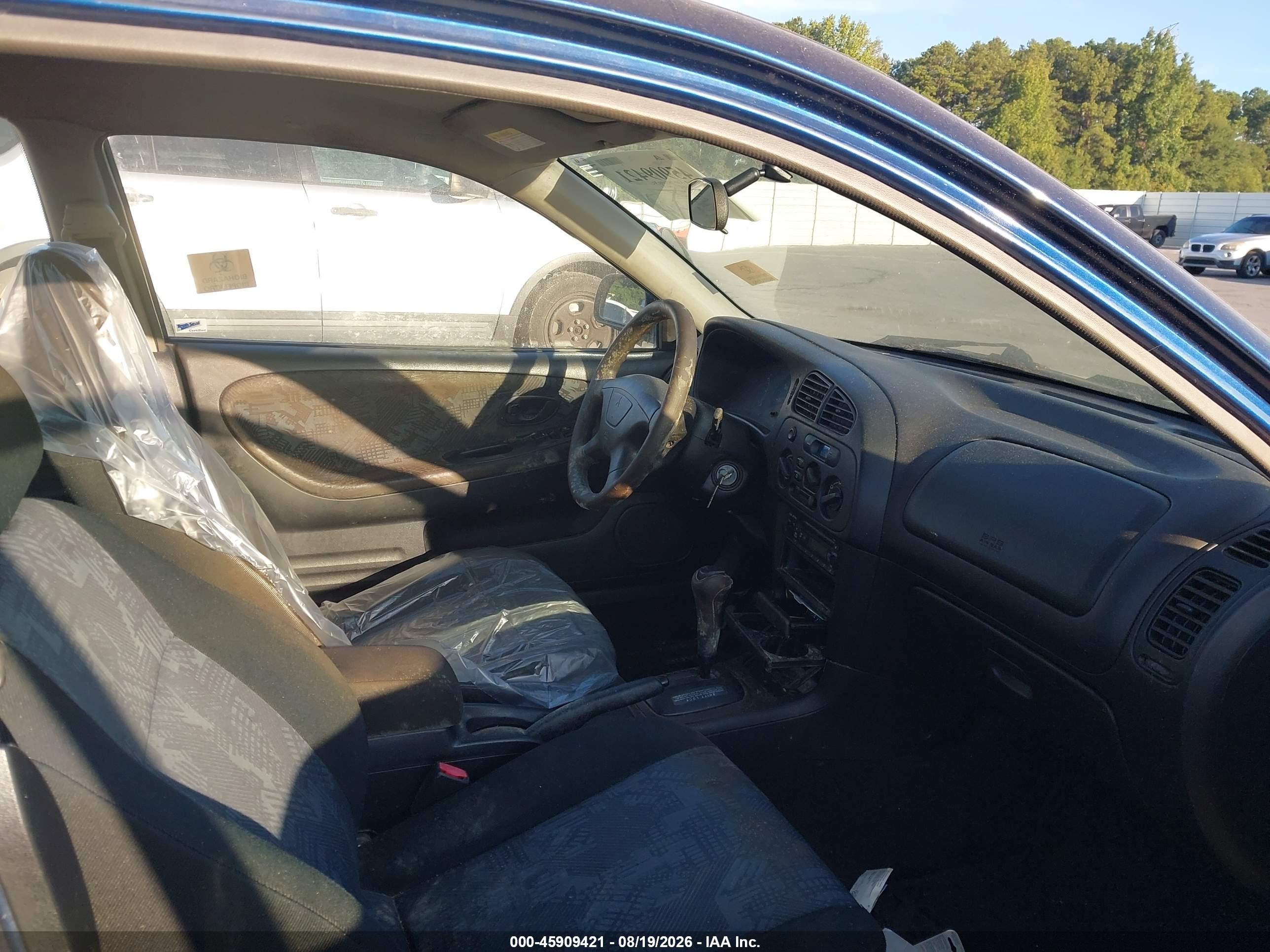 2002 Mitsubishi Mirage De Blue vin: JA3AY11A62U077329