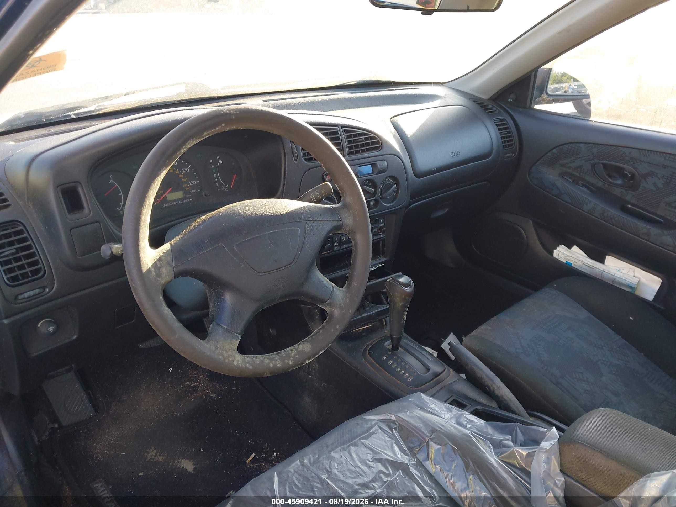 2002 Mitsubishi Mirage De Blue vin: JA3AY11A62U077329