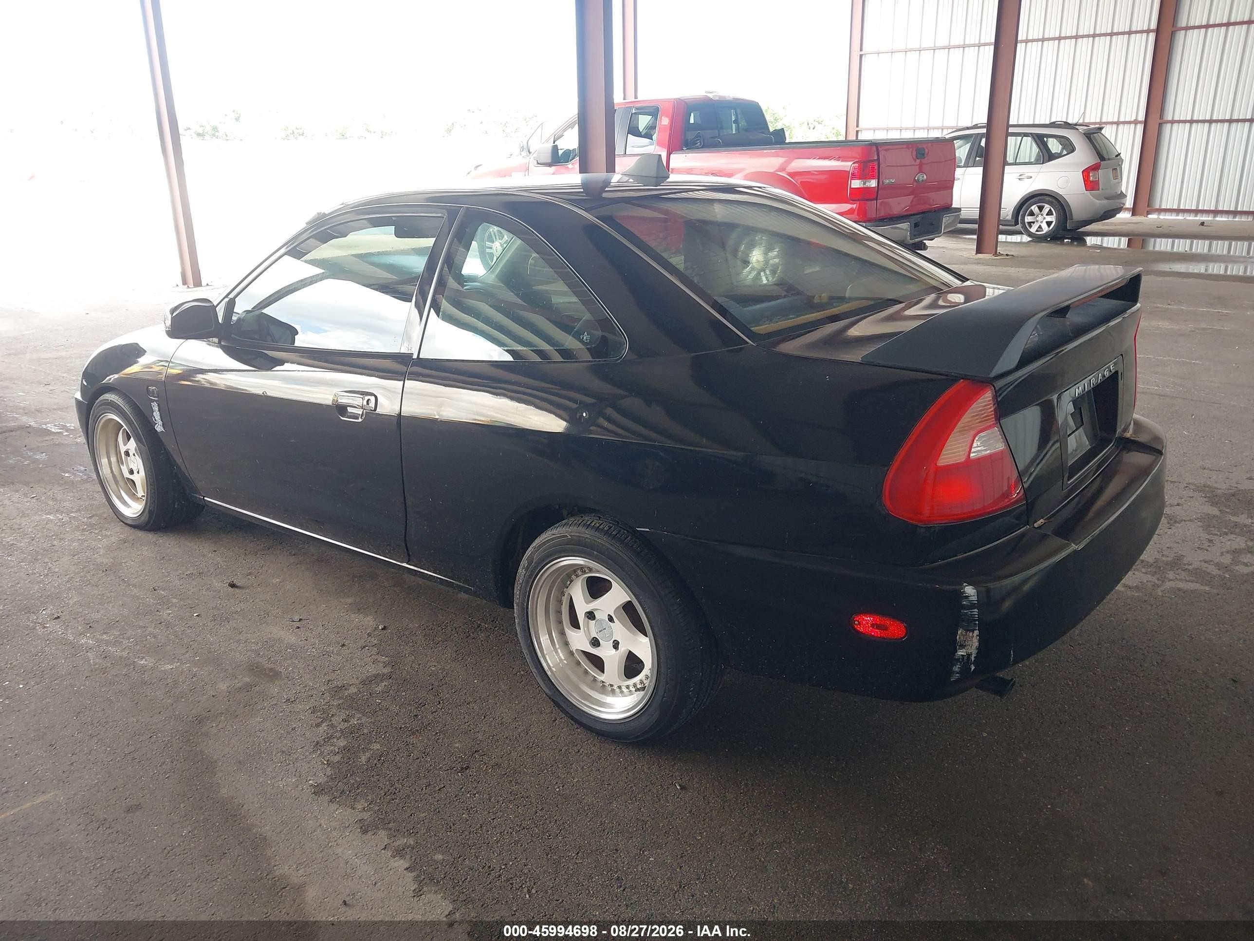 2000 Mitsubishi Mirage De Black vin: JA3AY11A9YU014458