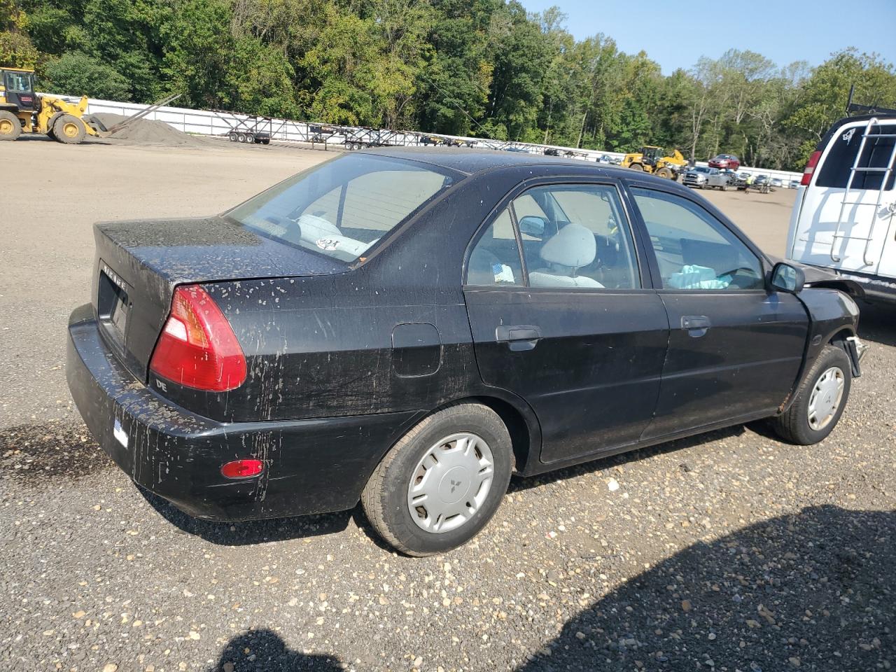 1999 Mitsubishi Mirage De Black vin: JA3AY26A0XU021702