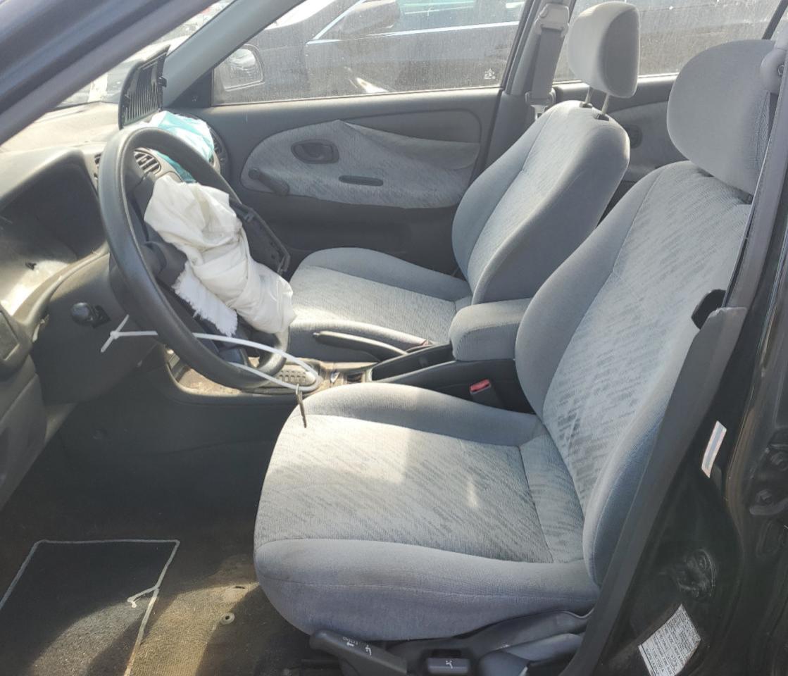 1999 Mitsubishi Mirage De Black vin: JA3AY26A0XU021702