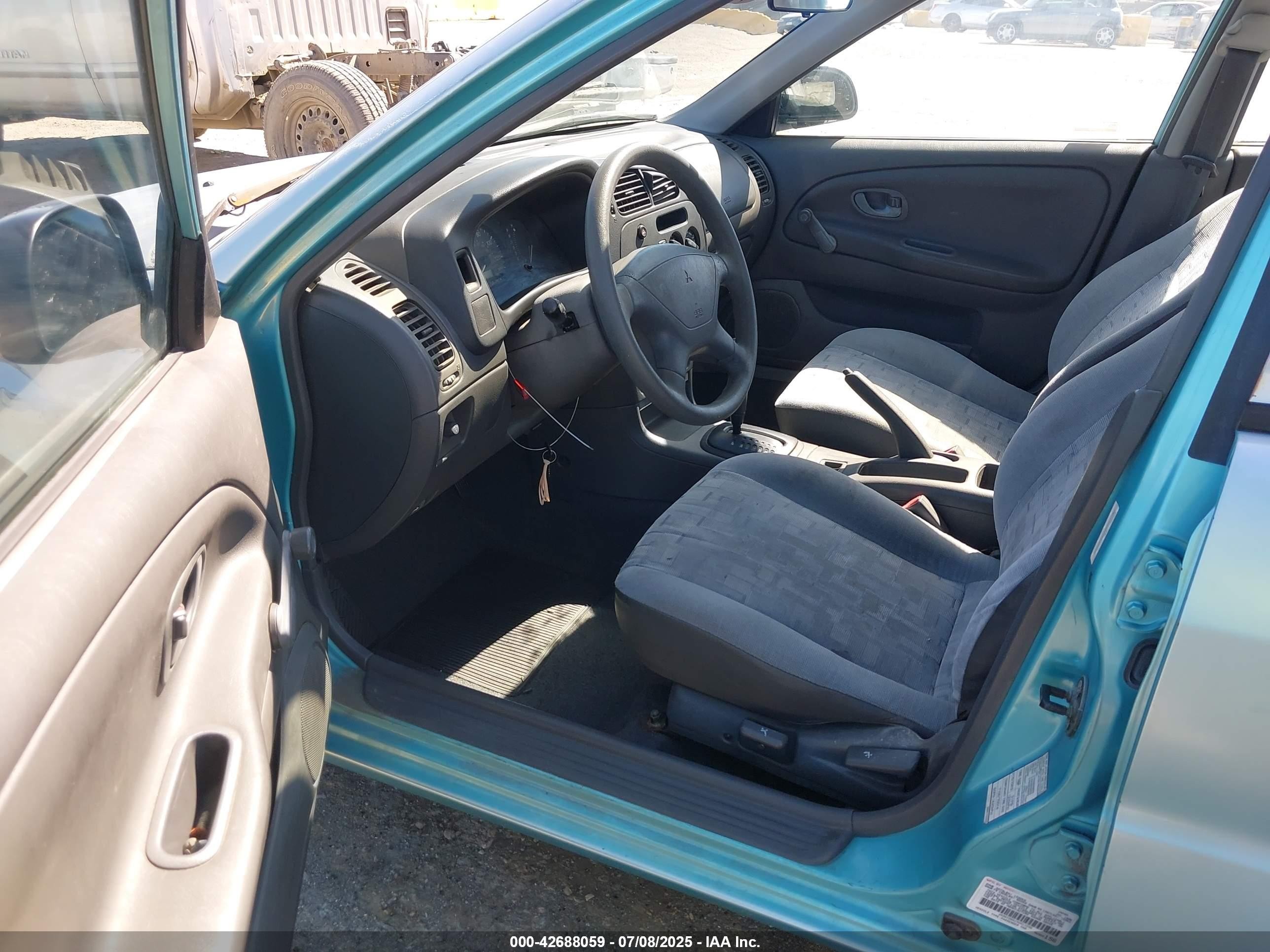 1997 Mitsubishi Mirage De Blue vin: JA3AY26A1VU011032