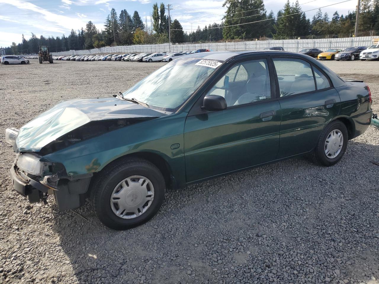 1999 Mitsubishi Mirage De Green vin: JA3AY26A2XU026593