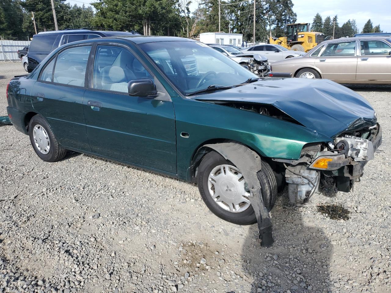 1999 Mitsubishi Mirage De Green vin: JA3AY26A2XU026593