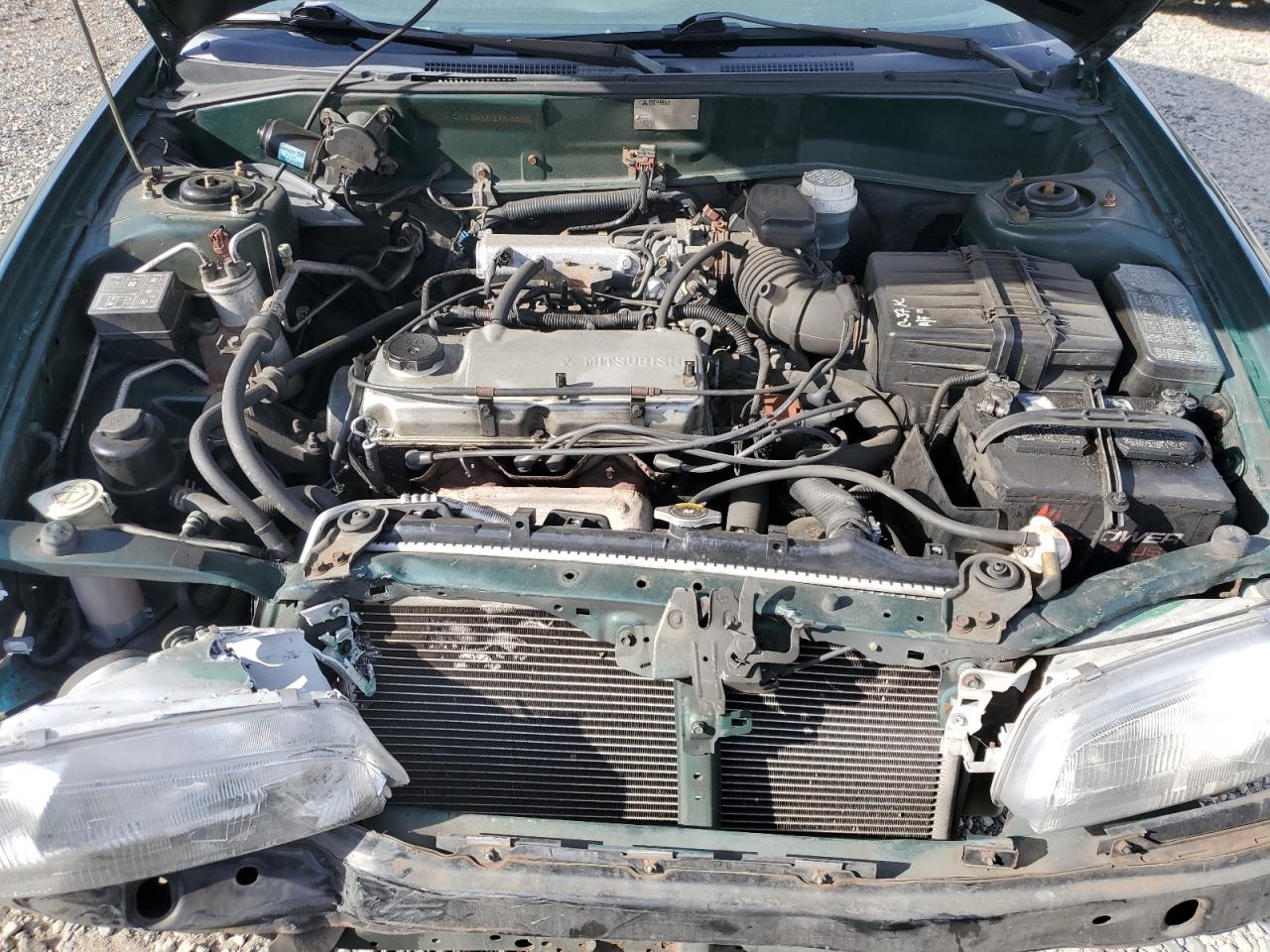 1999 Mitsubishi Mirage De Green vin: JA3AY26A2XU026593